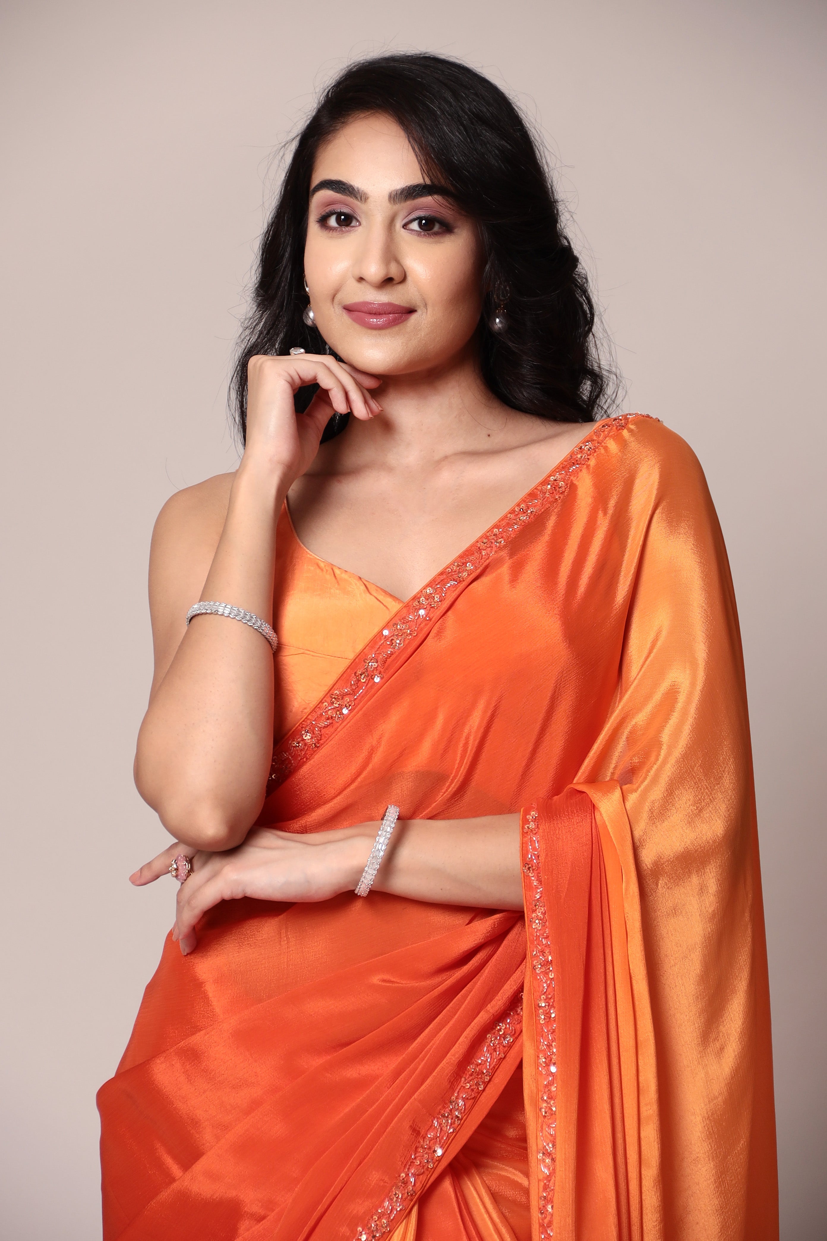 Exquisite Silk Saree adorned with intricate Cutdana embellishments.