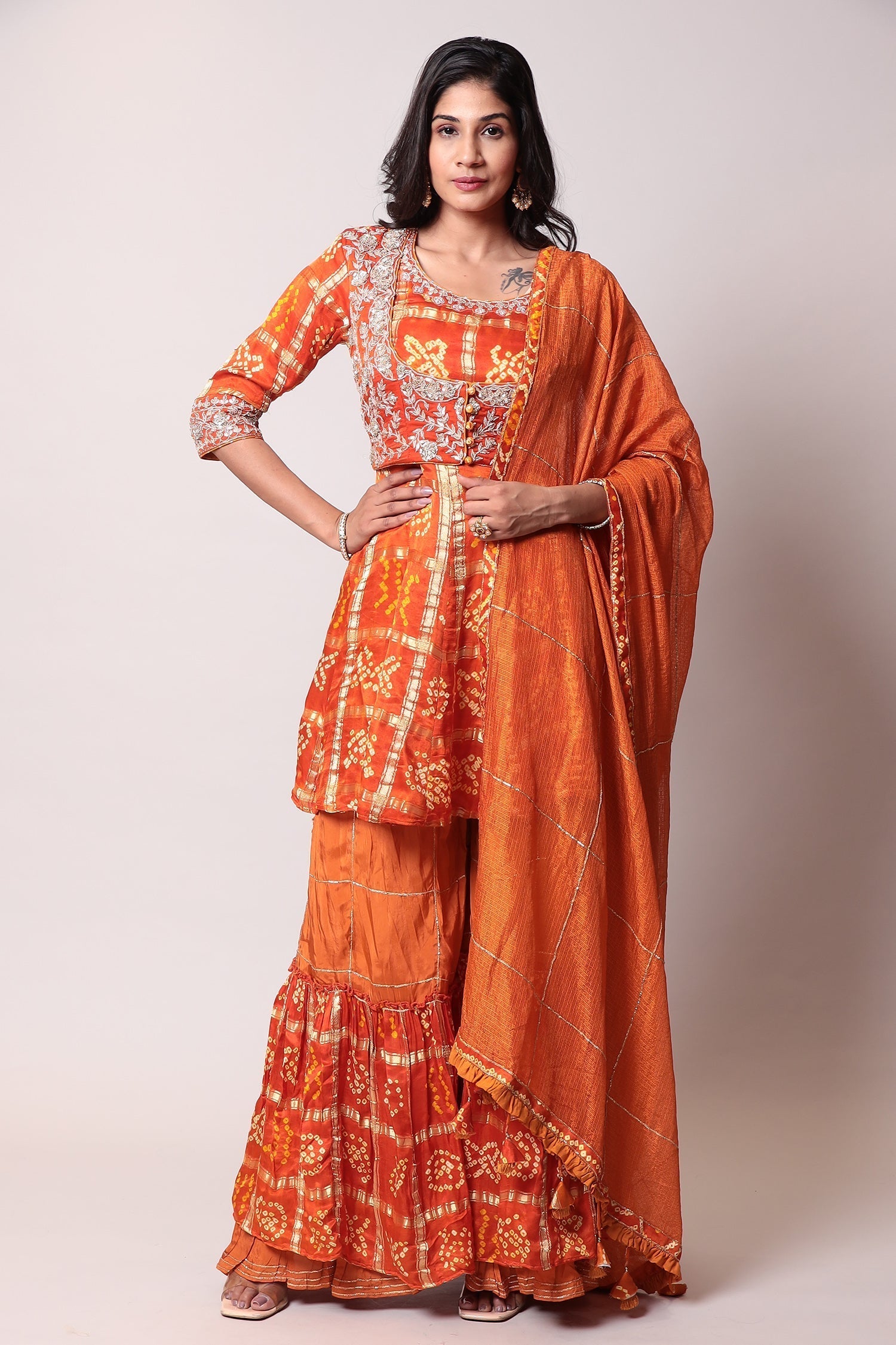 Peplum Ghatchola Bandhej silk Suit with Gota Patti work.