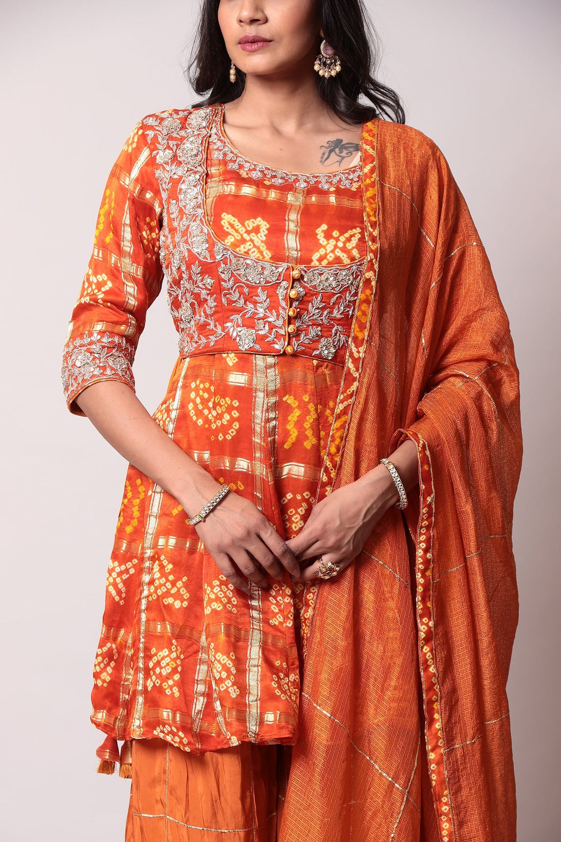 Peplum Ghatchola Bandhej silk Suit with Gota Patti work.