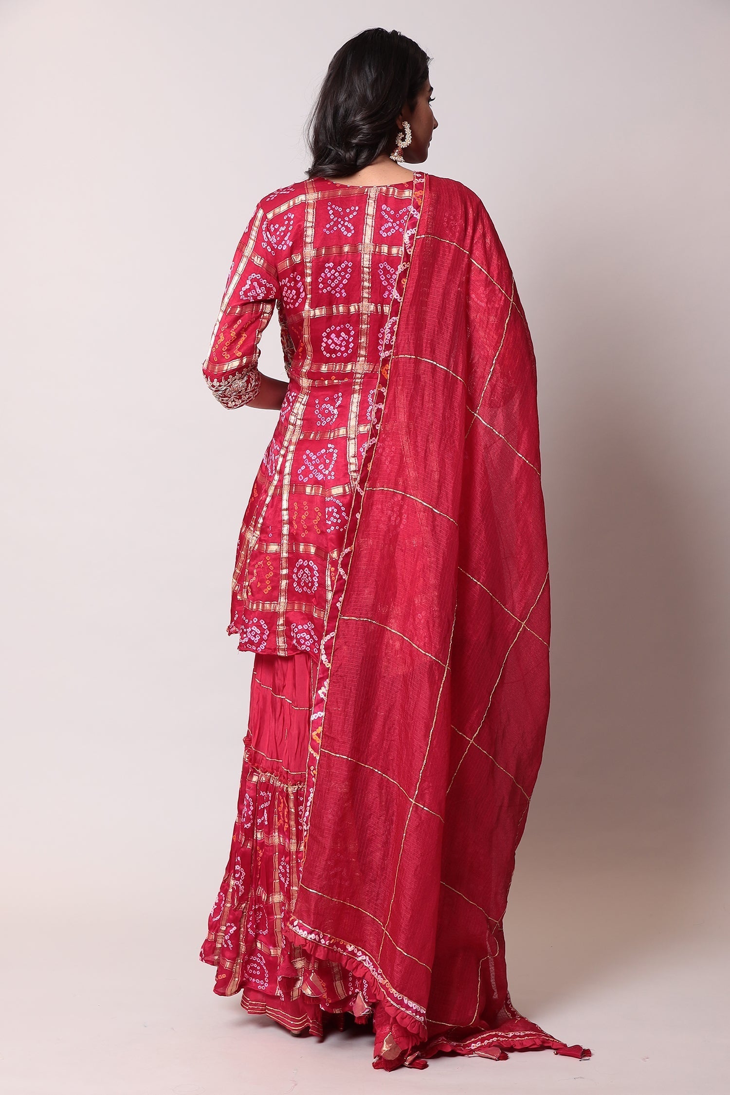 Peplum Ghatchola Bandhej silk Suit with Gota Patti work.