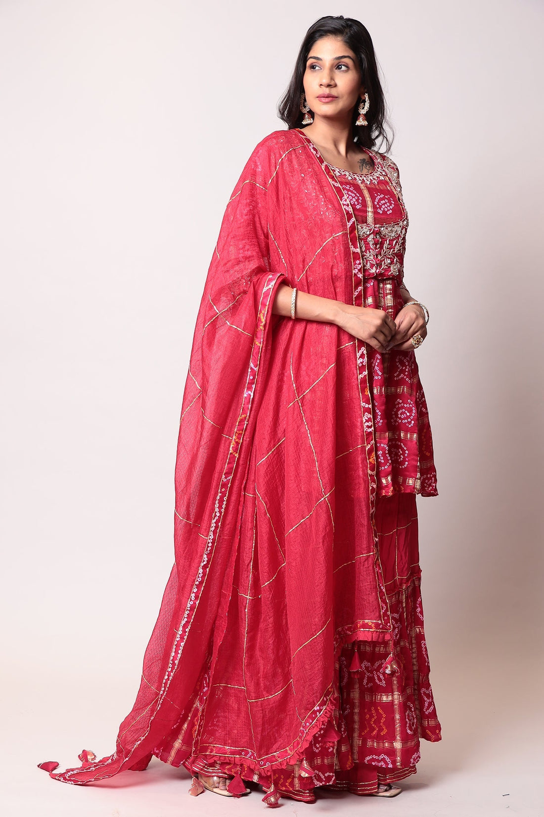 Peplum Ghatchola Bandhej silk Suit with Gota Patti work.