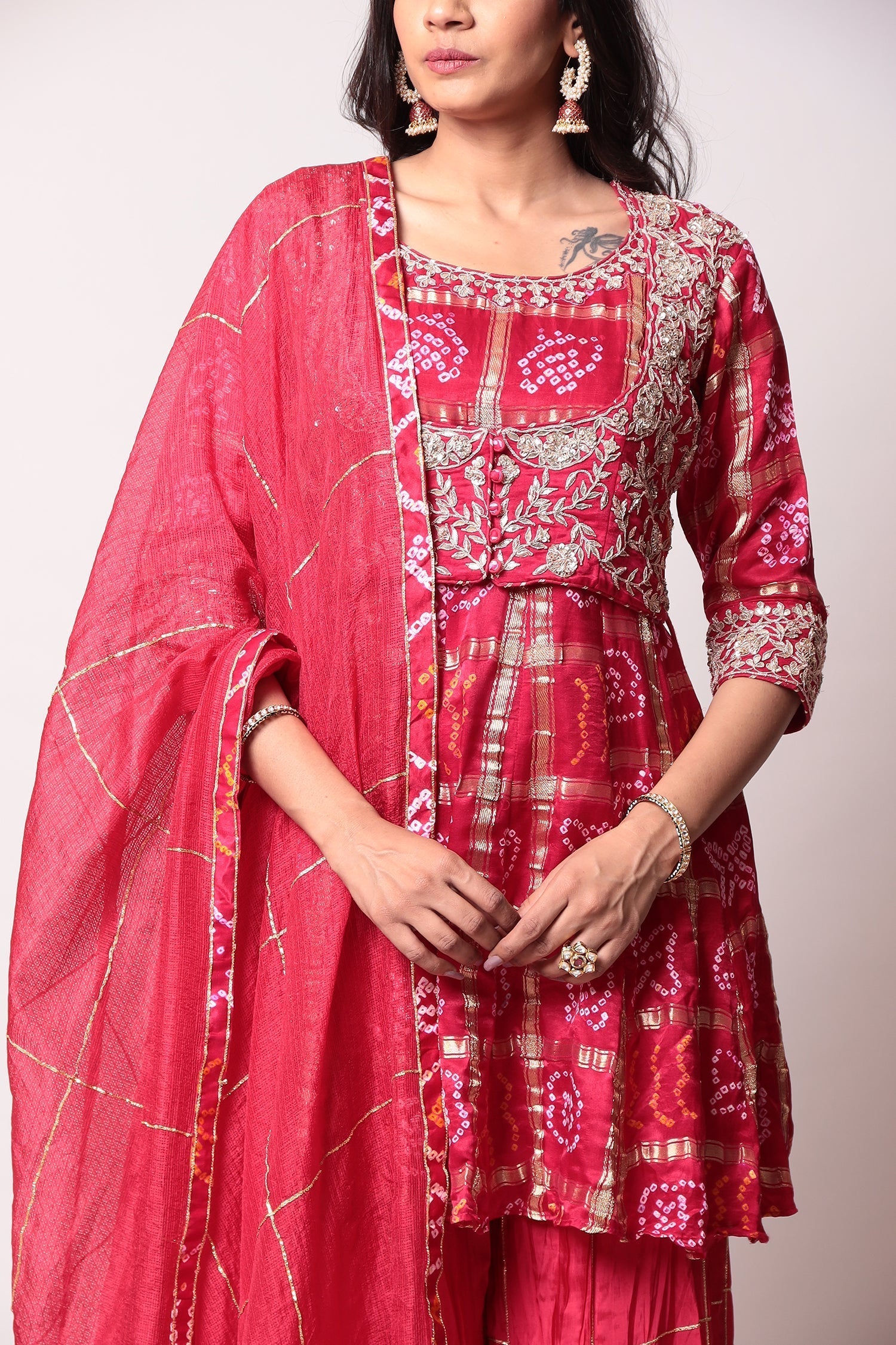 Peplum Ghatchola Bandhej silk Suit with Gota Patti work.