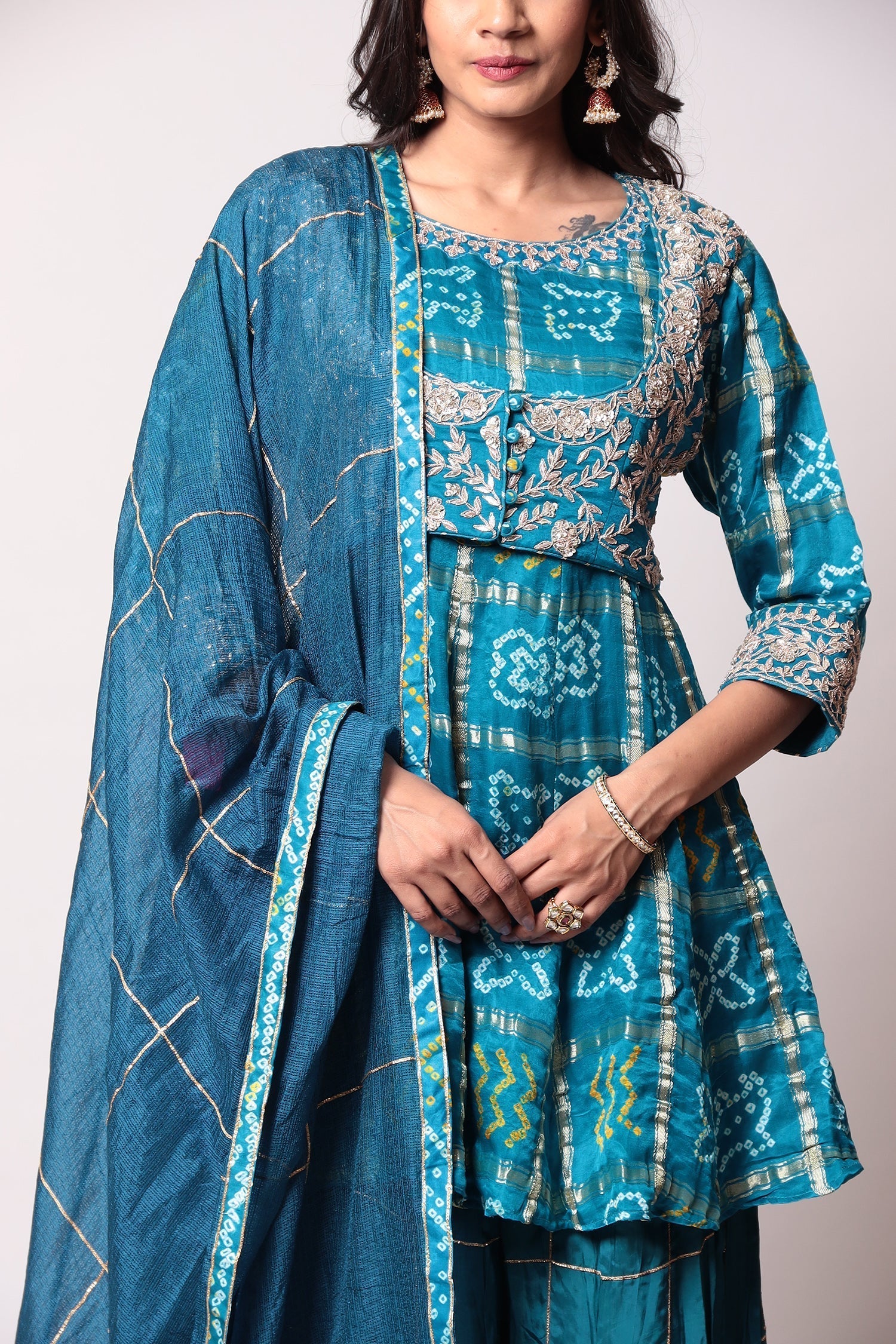 Peplum Ghatchola Bandhej silk Suit with Gota Patti work.