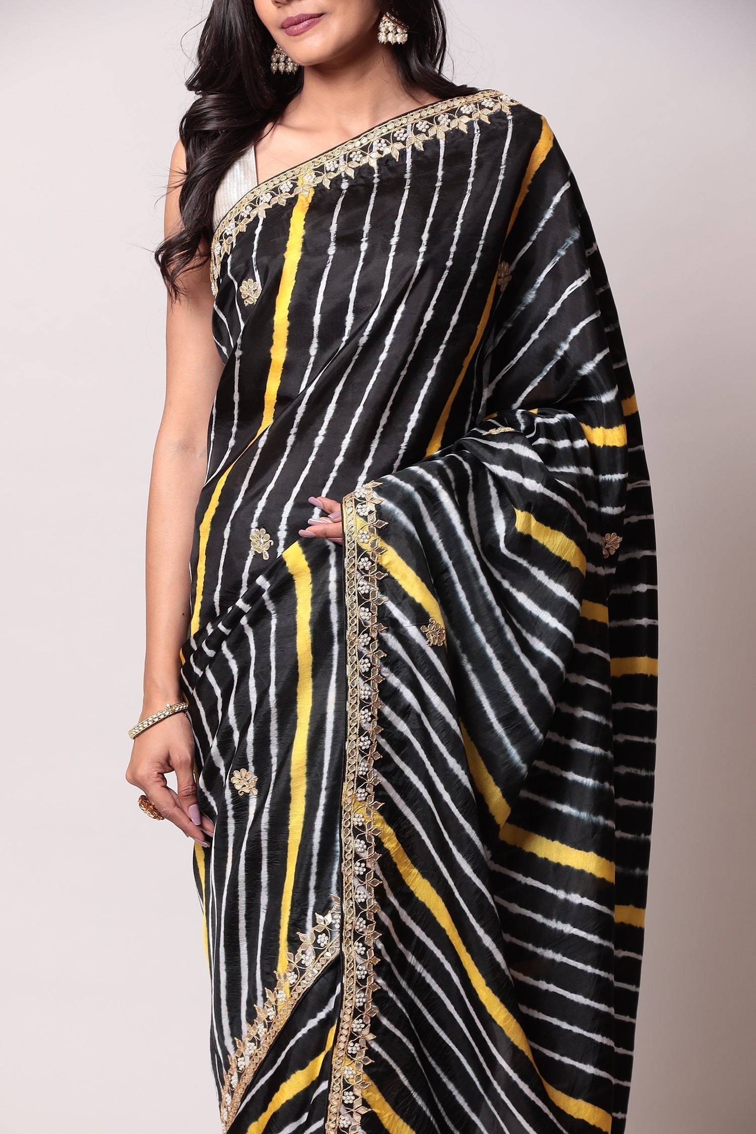 Leheriya Silk Saree with Gota Patti work.