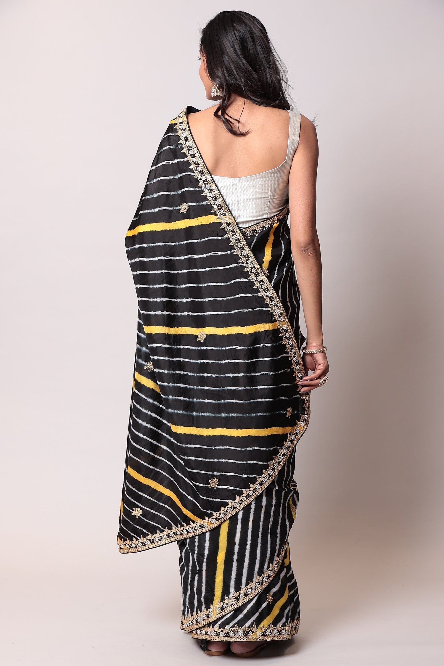 Leheriya Silk Saree with Gota Patti work.