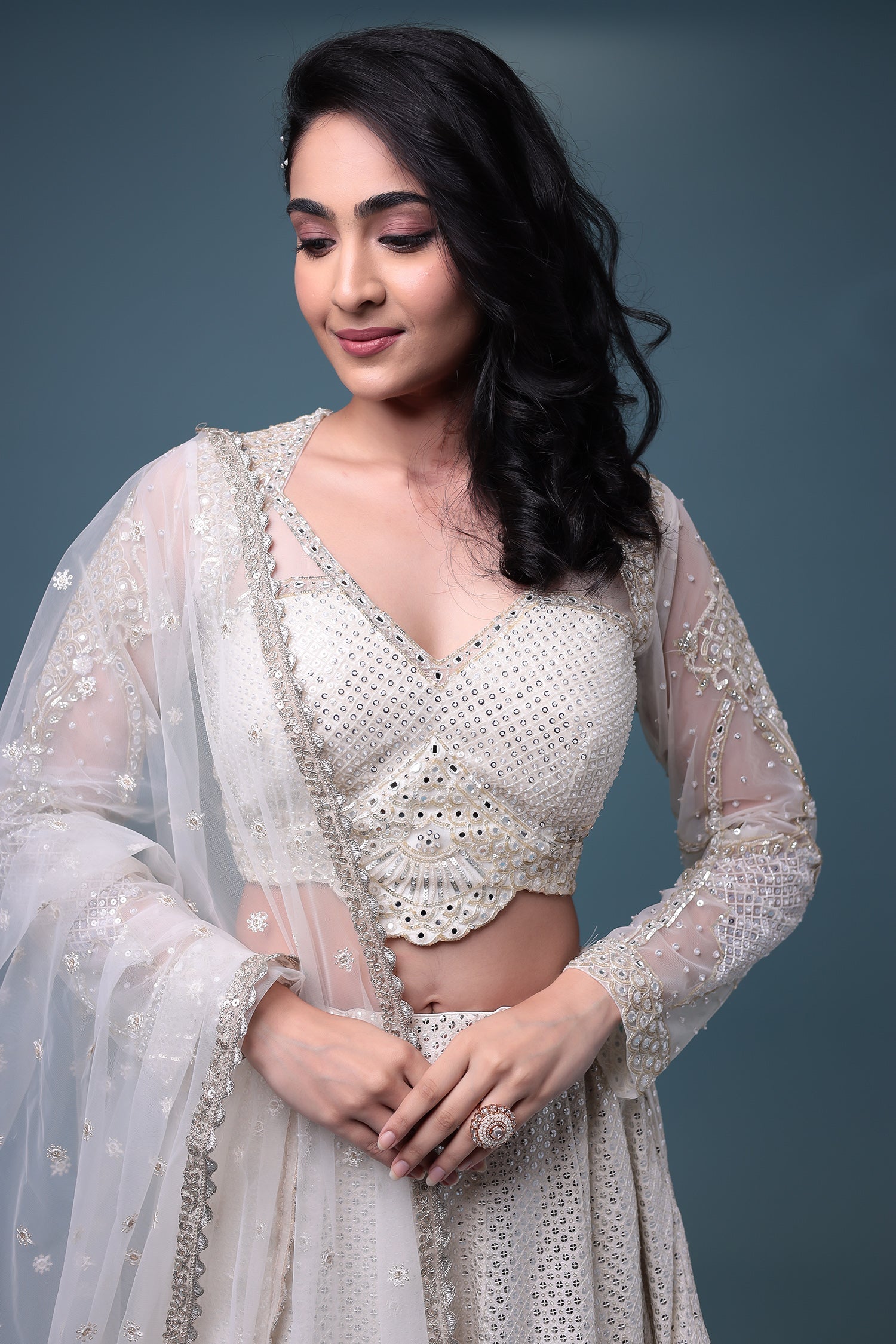 Embroidered Chiffon Lehenga with Mirror and Sequins work.