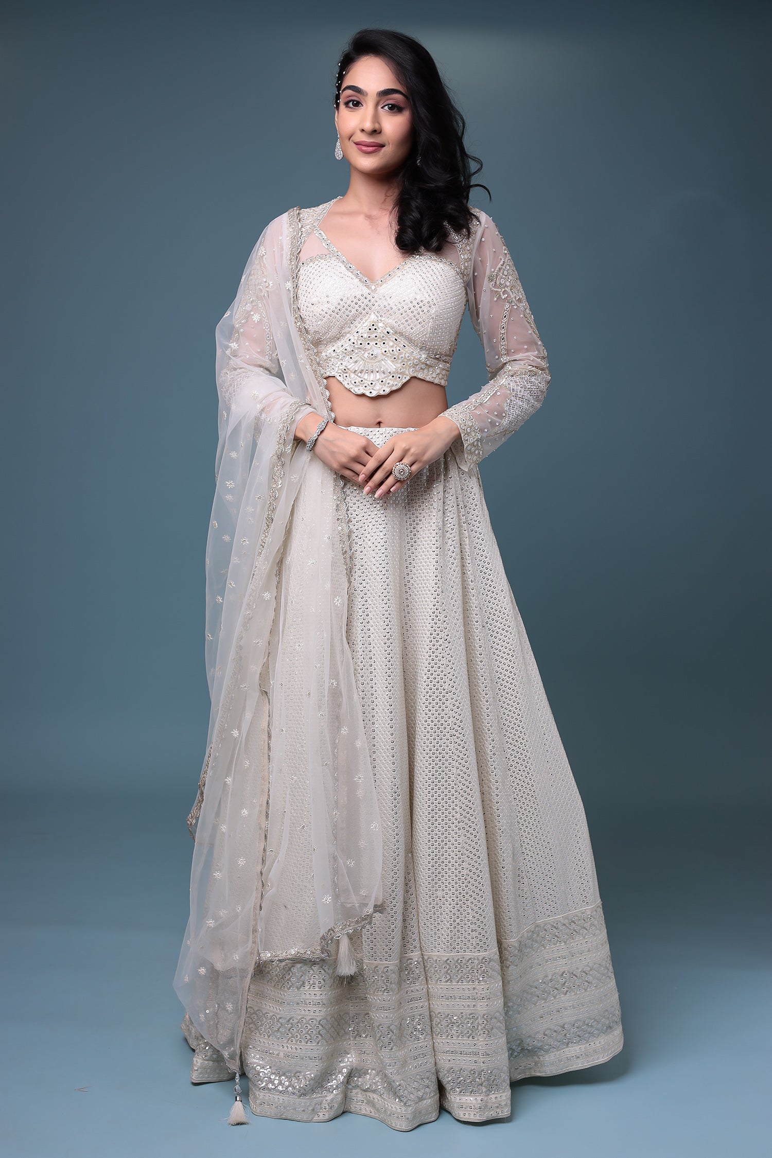 Embroidered Chiffon Lehenga with Mirror and Sequins work.