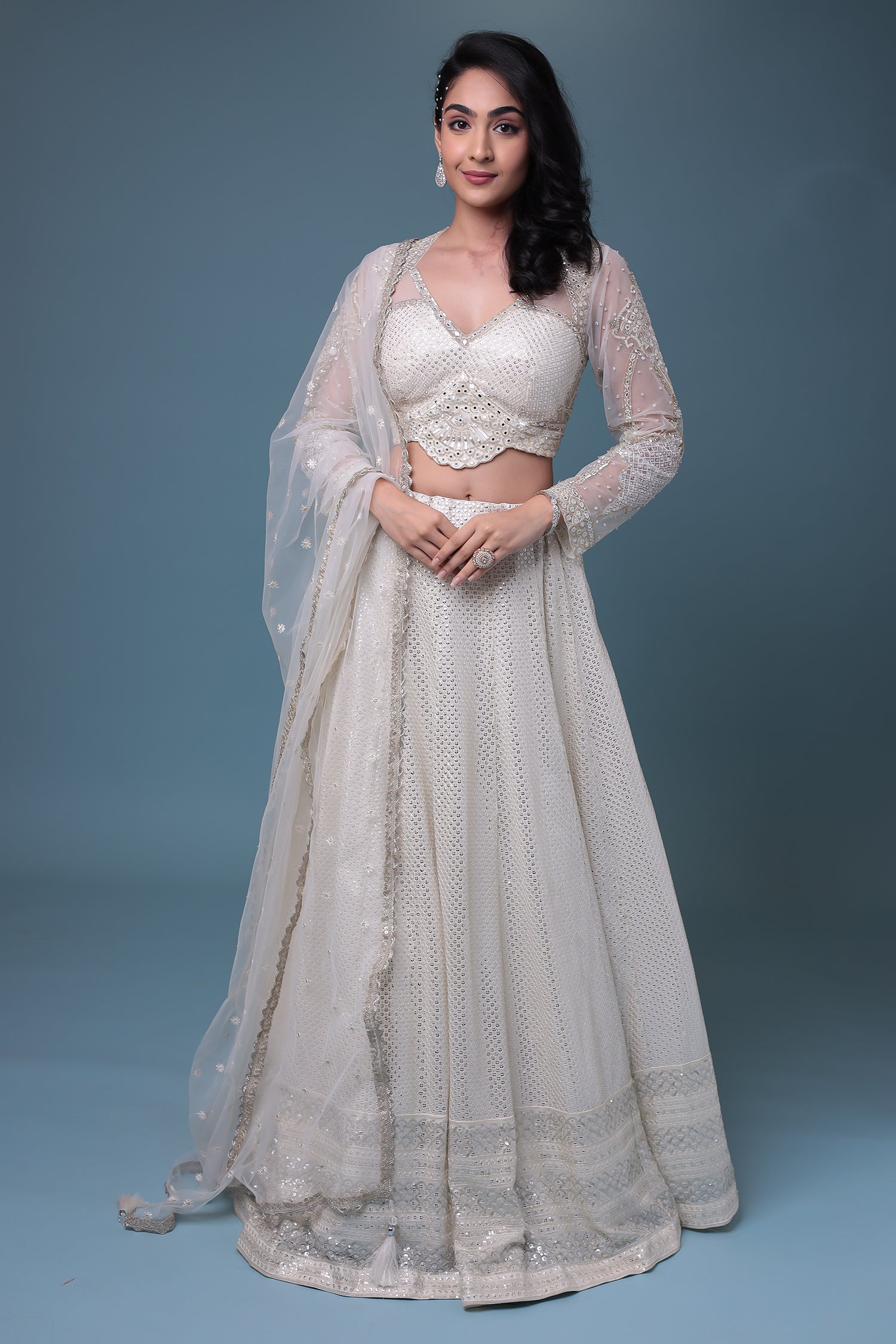 Embroidered Chiffon Lehenga with Mirror and Sequins work.