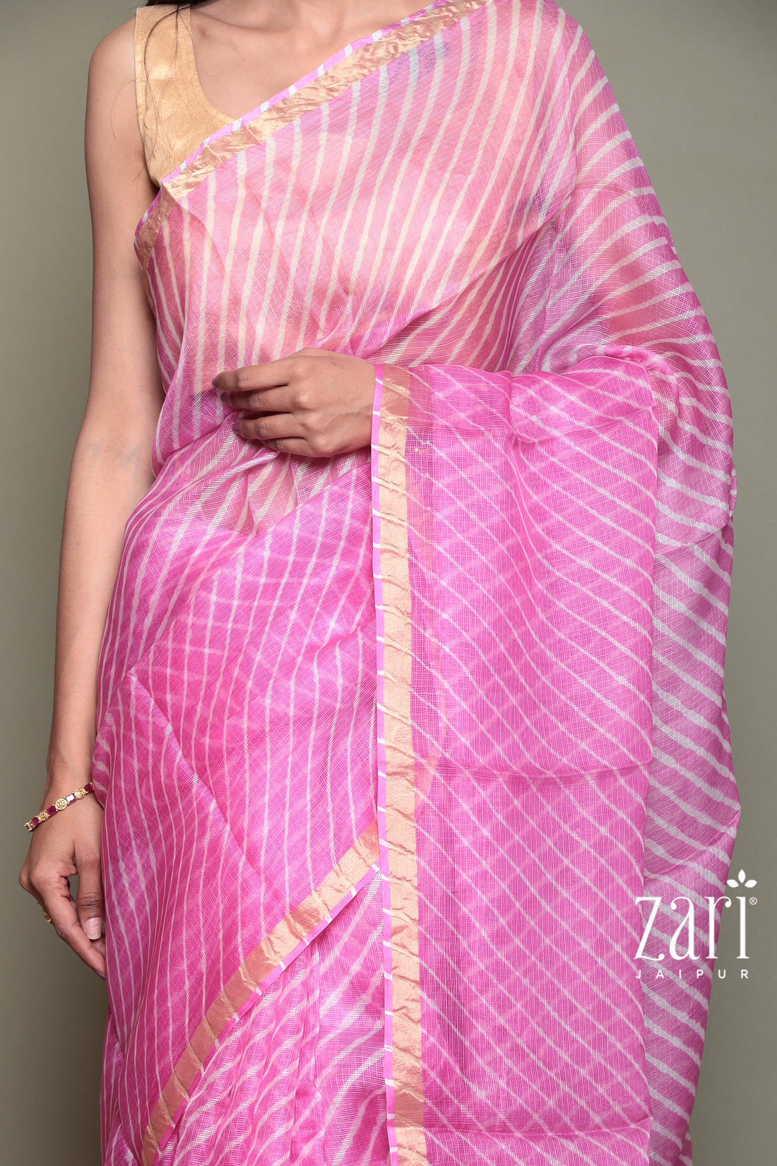 Kota Doria Silk Leheriya Saree with Zari work.