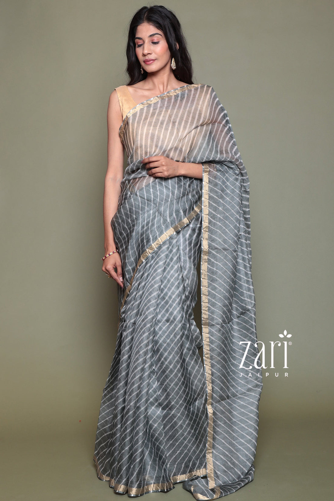 Kota Doria Silk Leheriya Saree with Zari work.