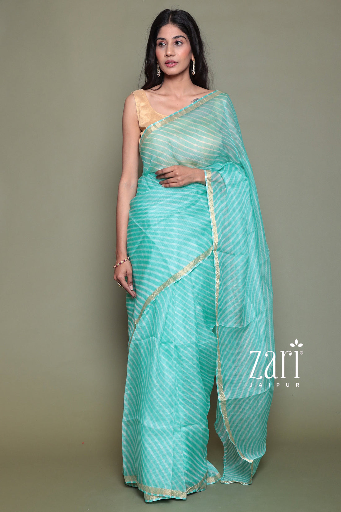 Kota Doria Silk Leheriya Saree with Zari work.
