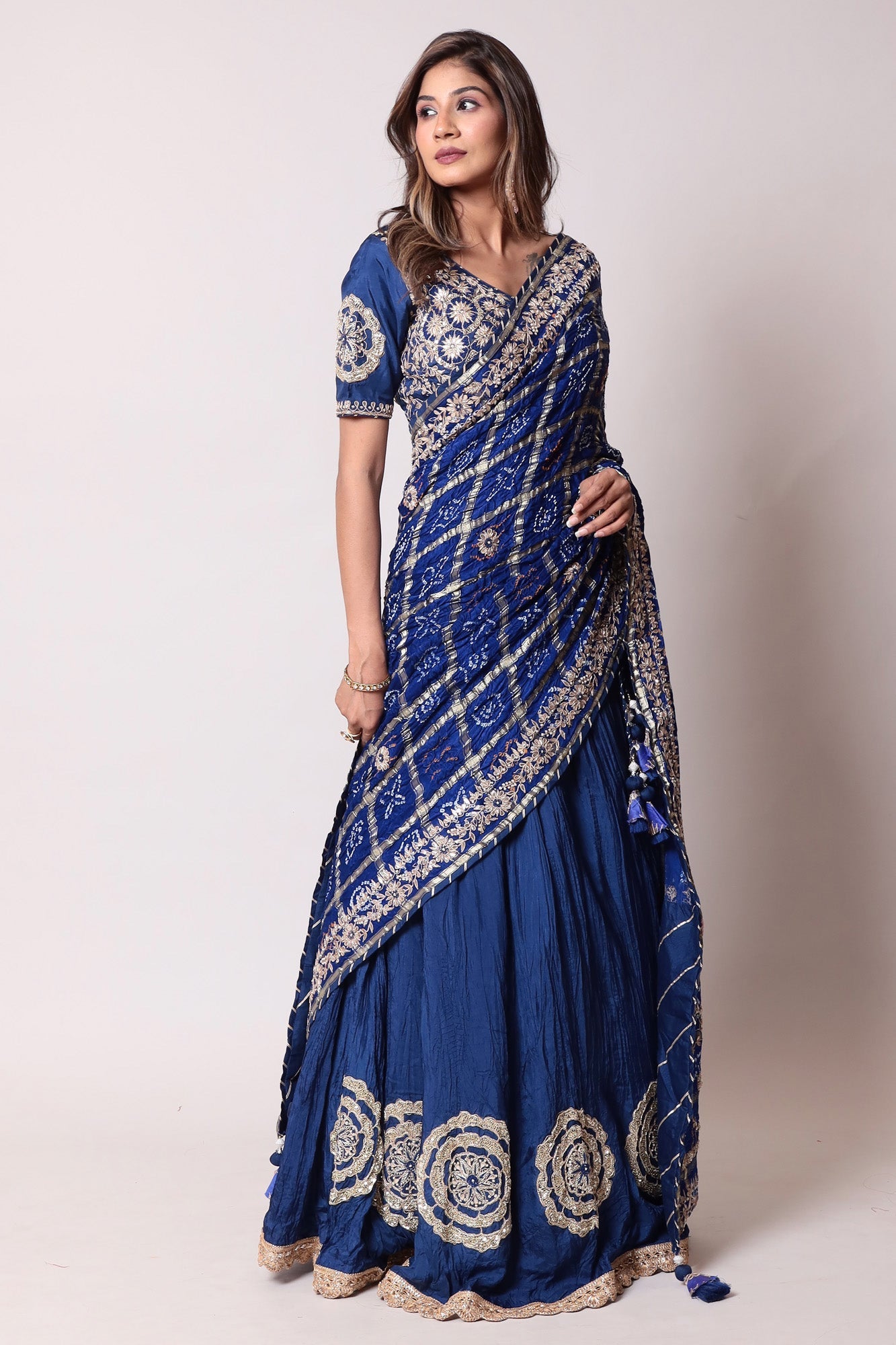 Ghatchola Bandhej Silk Lehenga with Zardozi work.