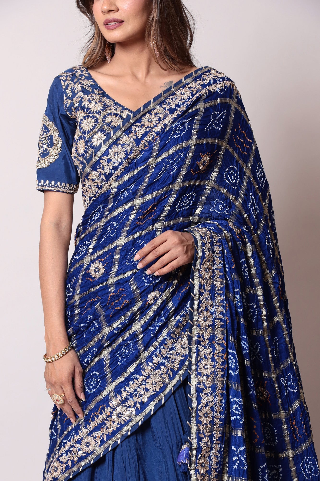 Ghatchola Bandhej Silk Lehenga with Zardozi work.