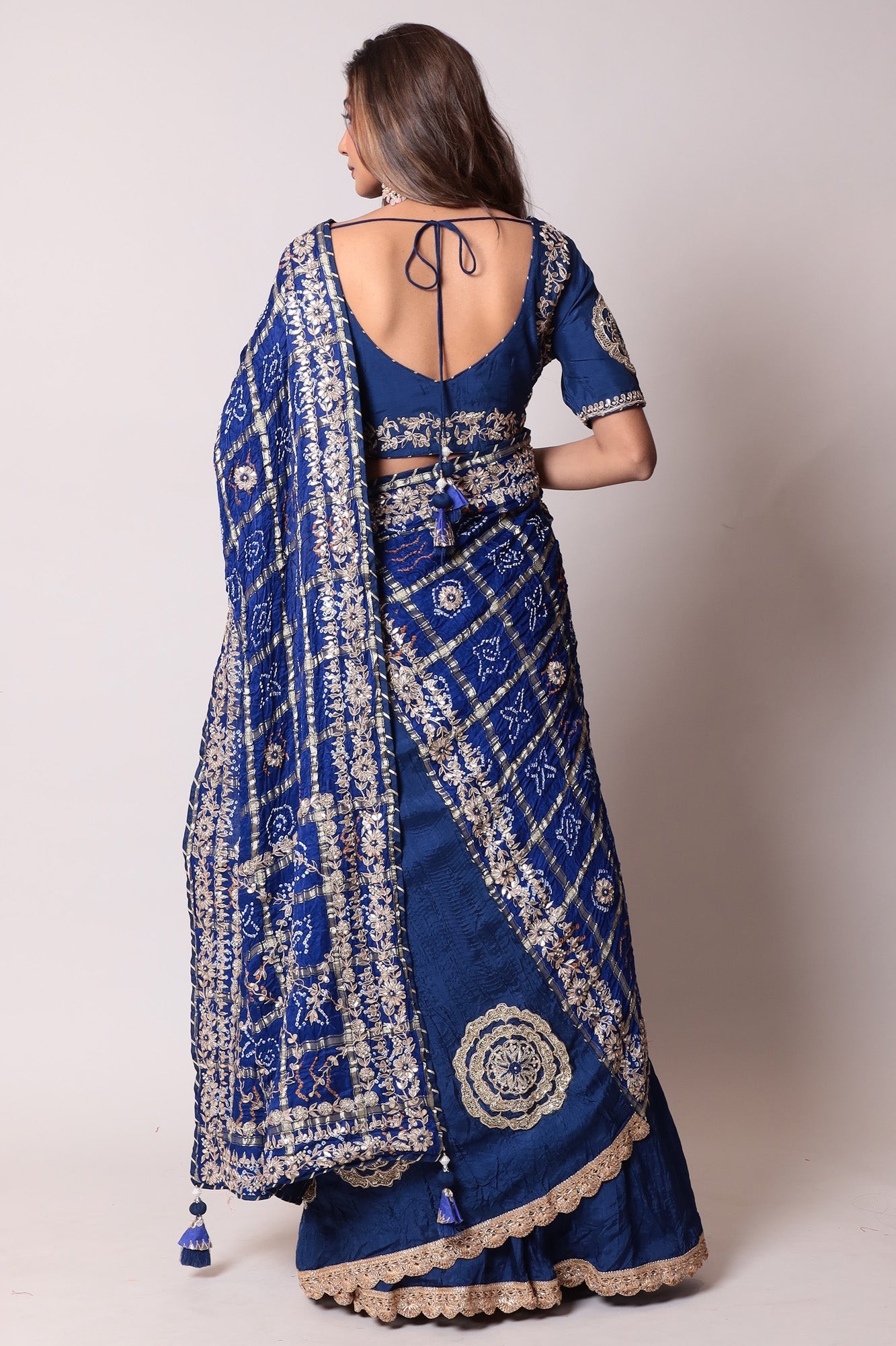 Ghatchola Bandhej Silk Lehenga with Zardozi work.