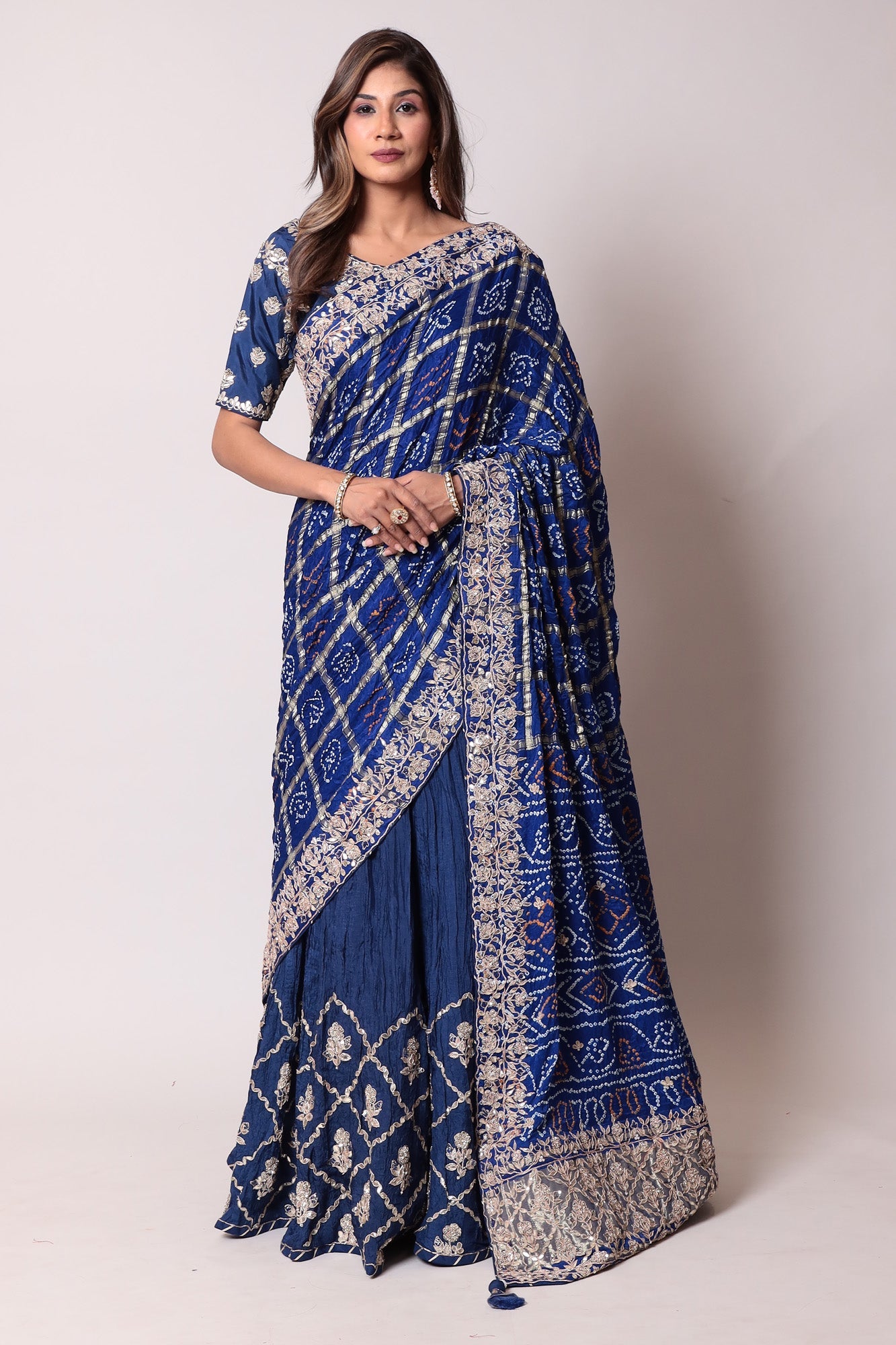 Ghatchola Bandhej Silk Lehenga with Zardozi work.