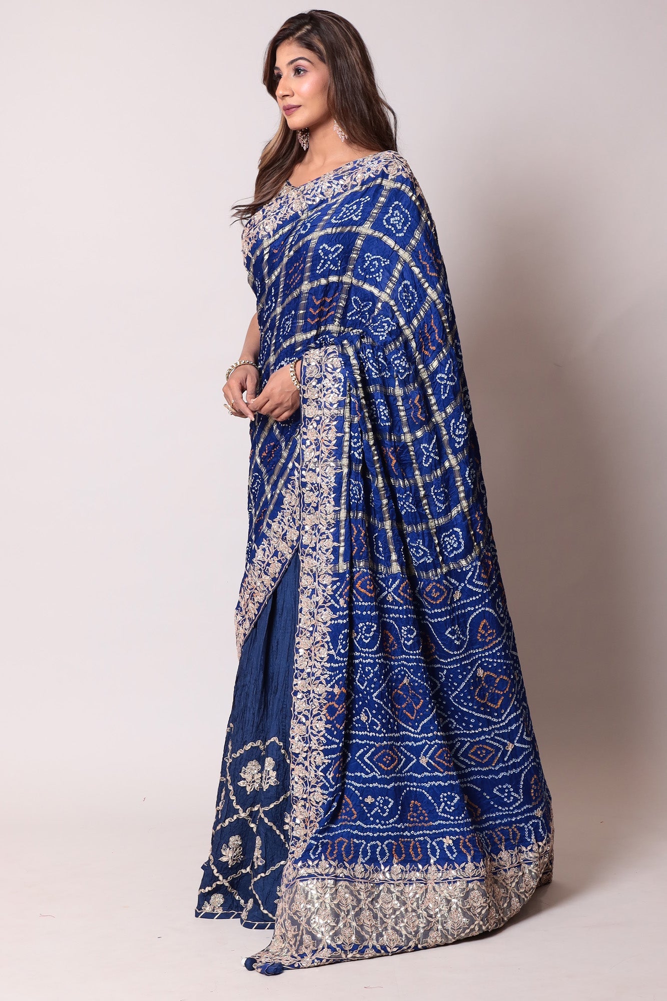 Ghatchola Bandhej Silk Lehenga with Zardozi work.