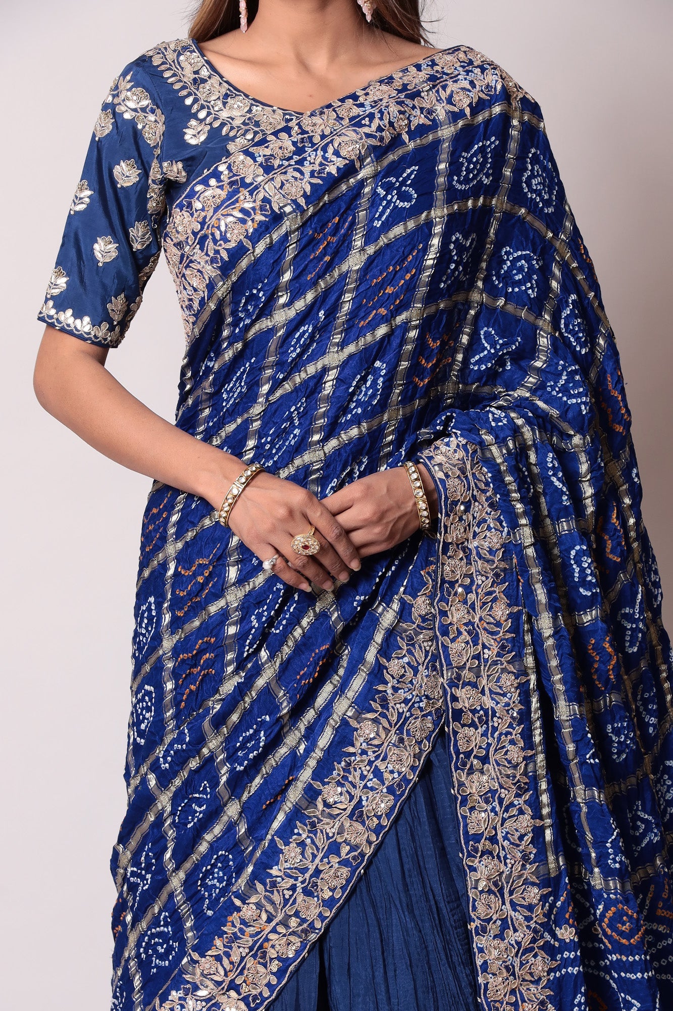 Ghatchola Bandhej Silk Lehenga with Zardozi work.