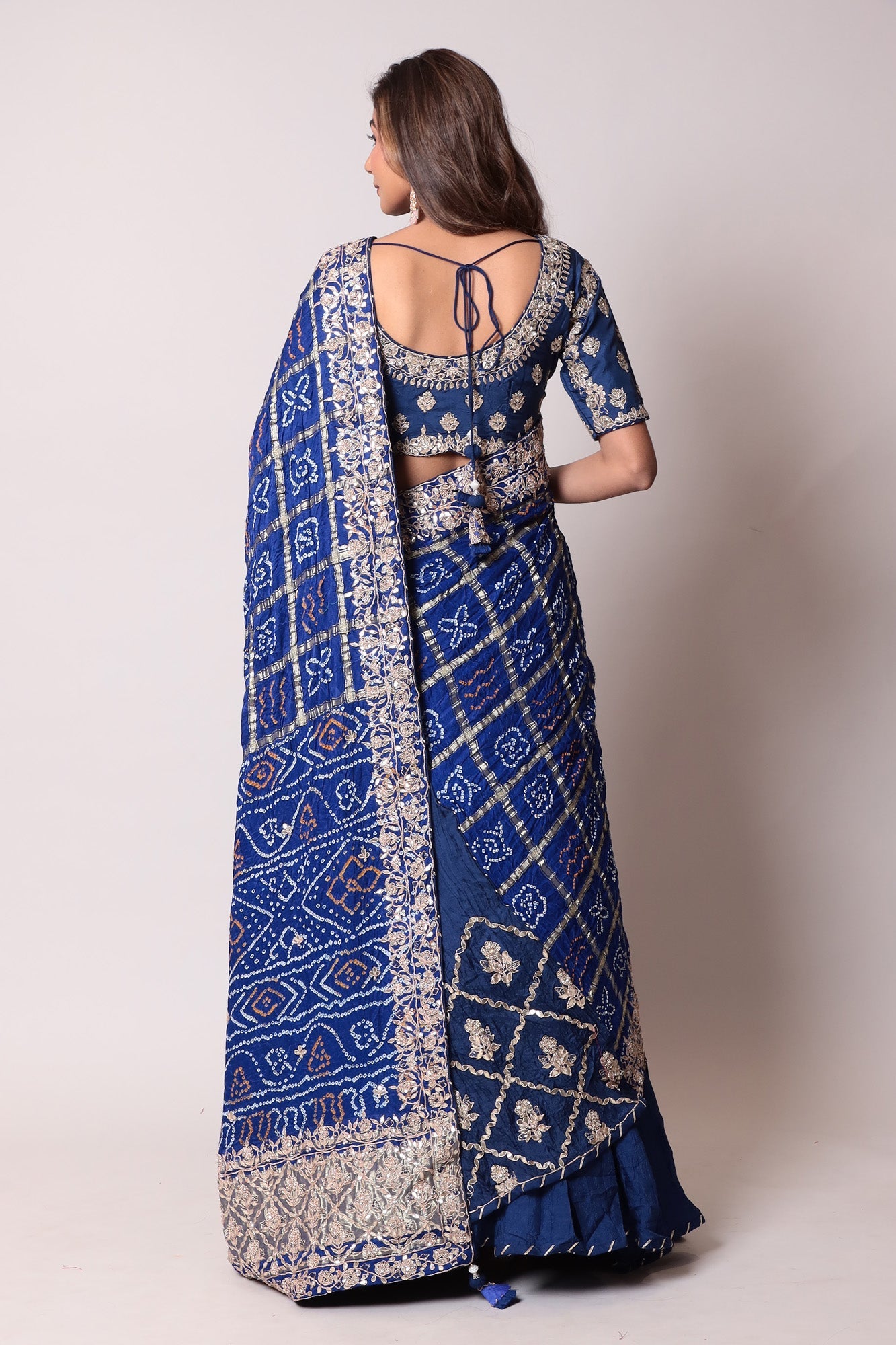 Ghatchola Bandhej Silk Lehenga with Zardozi work.