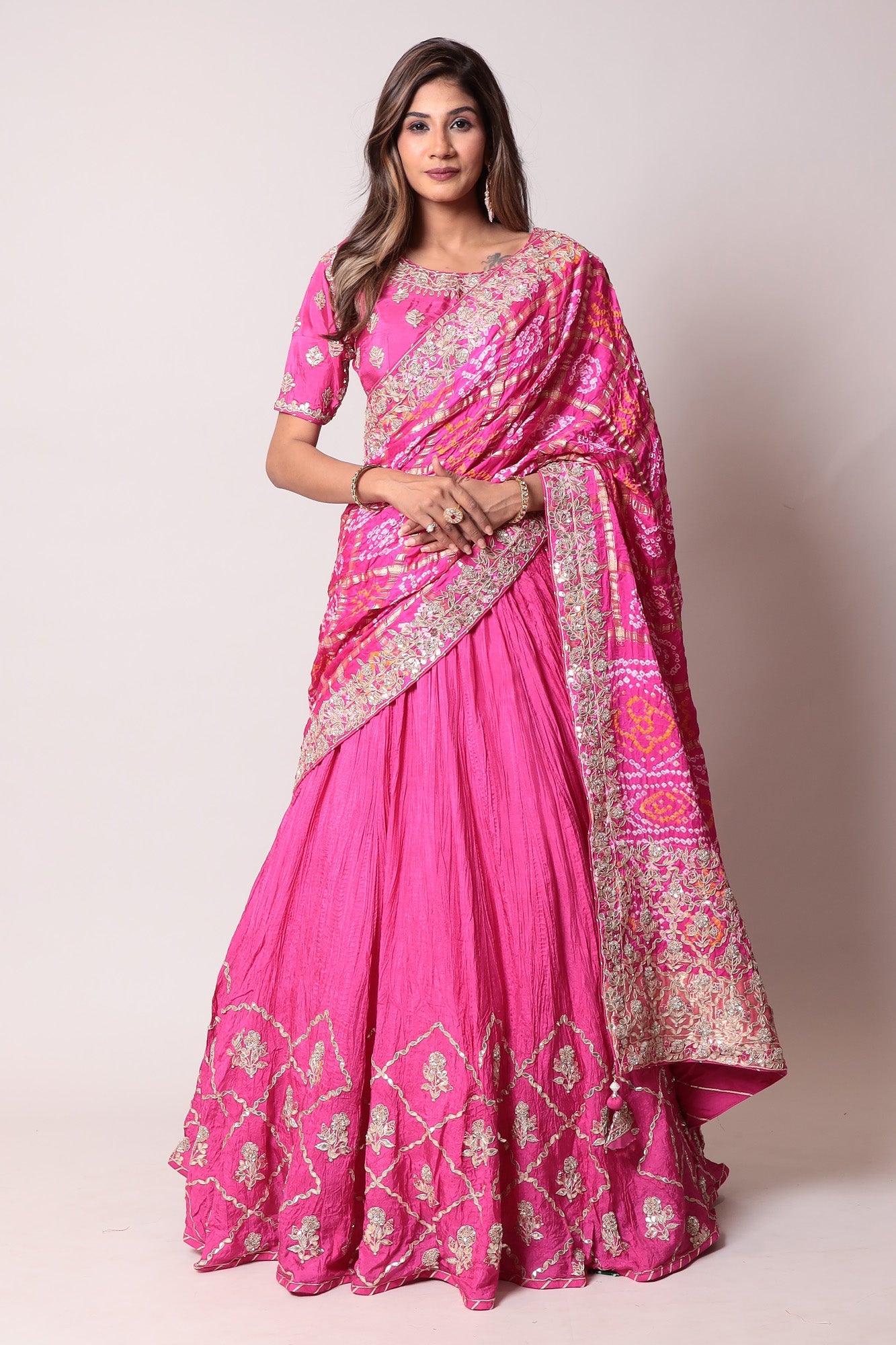 Ghatchola Bandhej Silk Lehenga with Zardozi work.