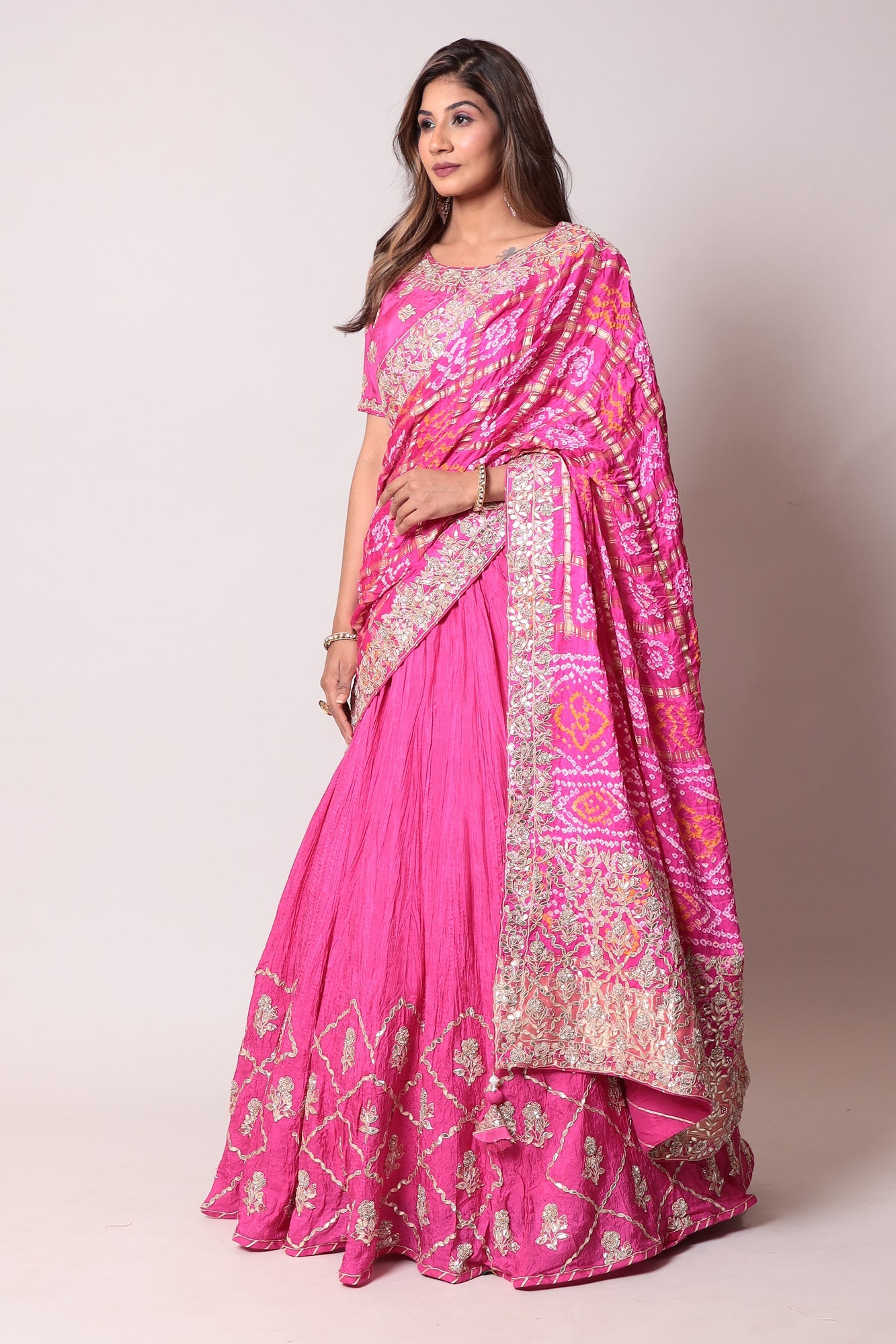 Ghatchola Bandhej Silk Lehenga with Zardozi work.