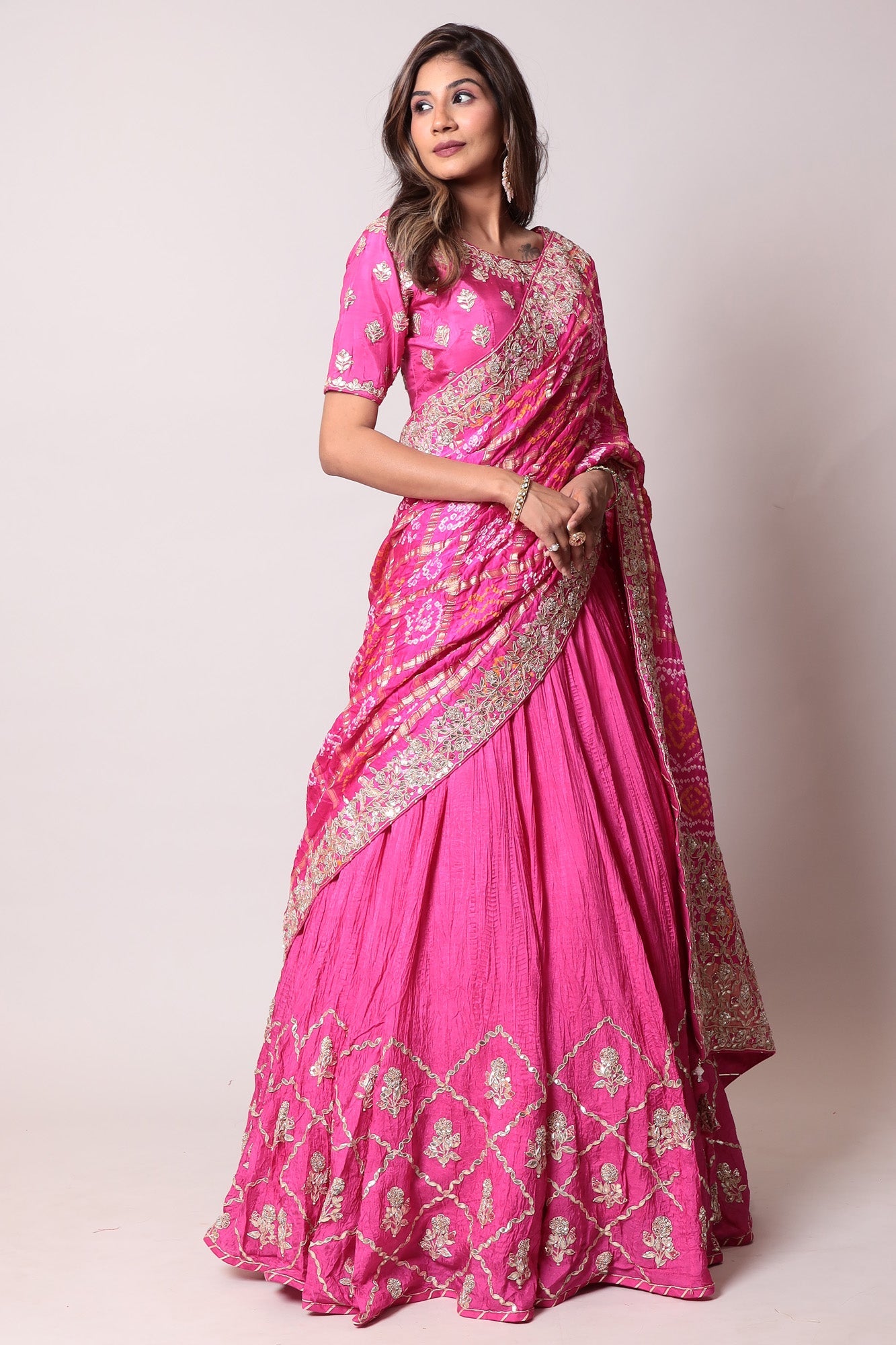 Ghatchola Bandhej Silk Lehenga with Zardozi work.