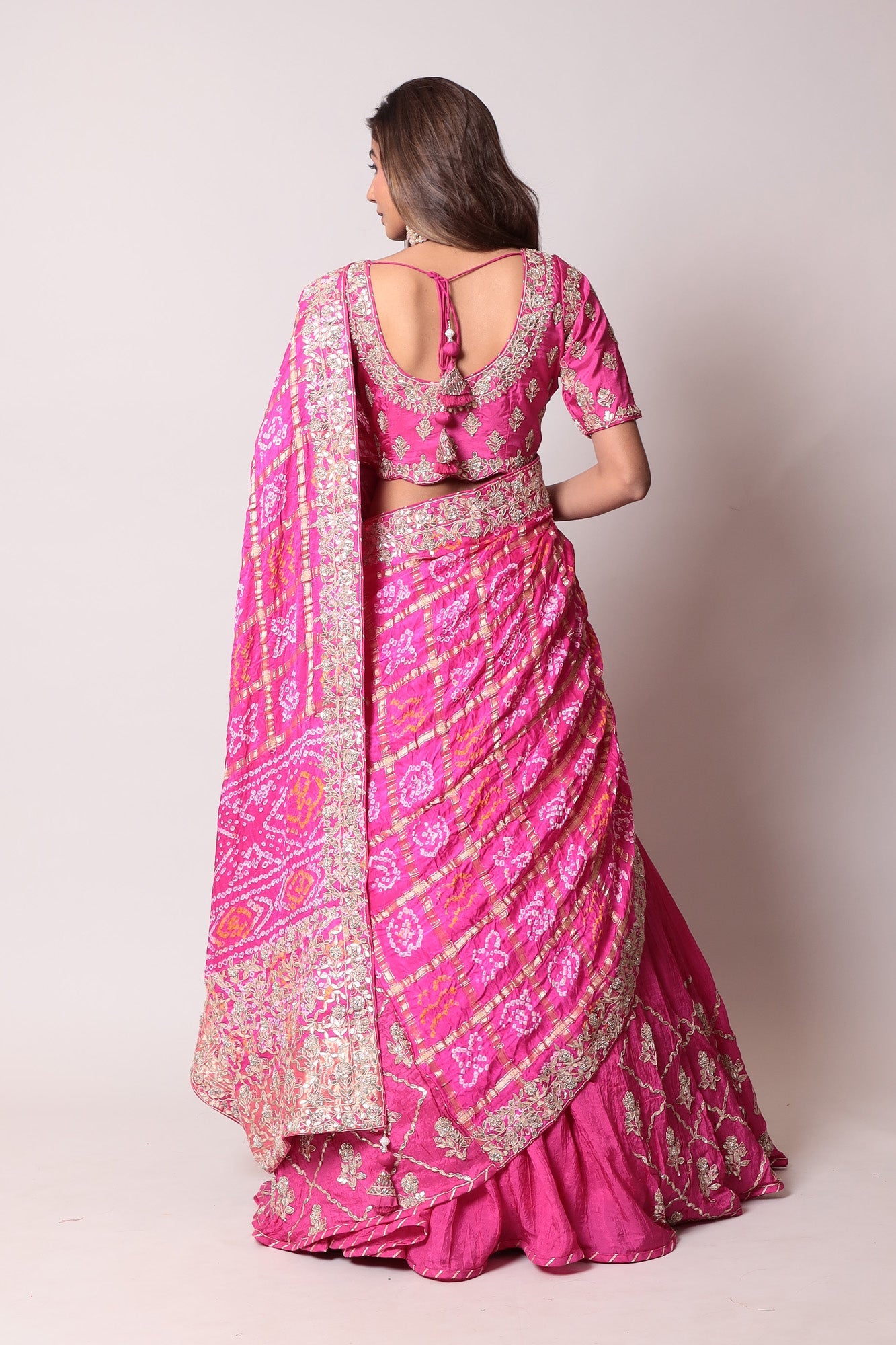 Ghatchola Bandhej Silk Lehenga with Zardozi work.