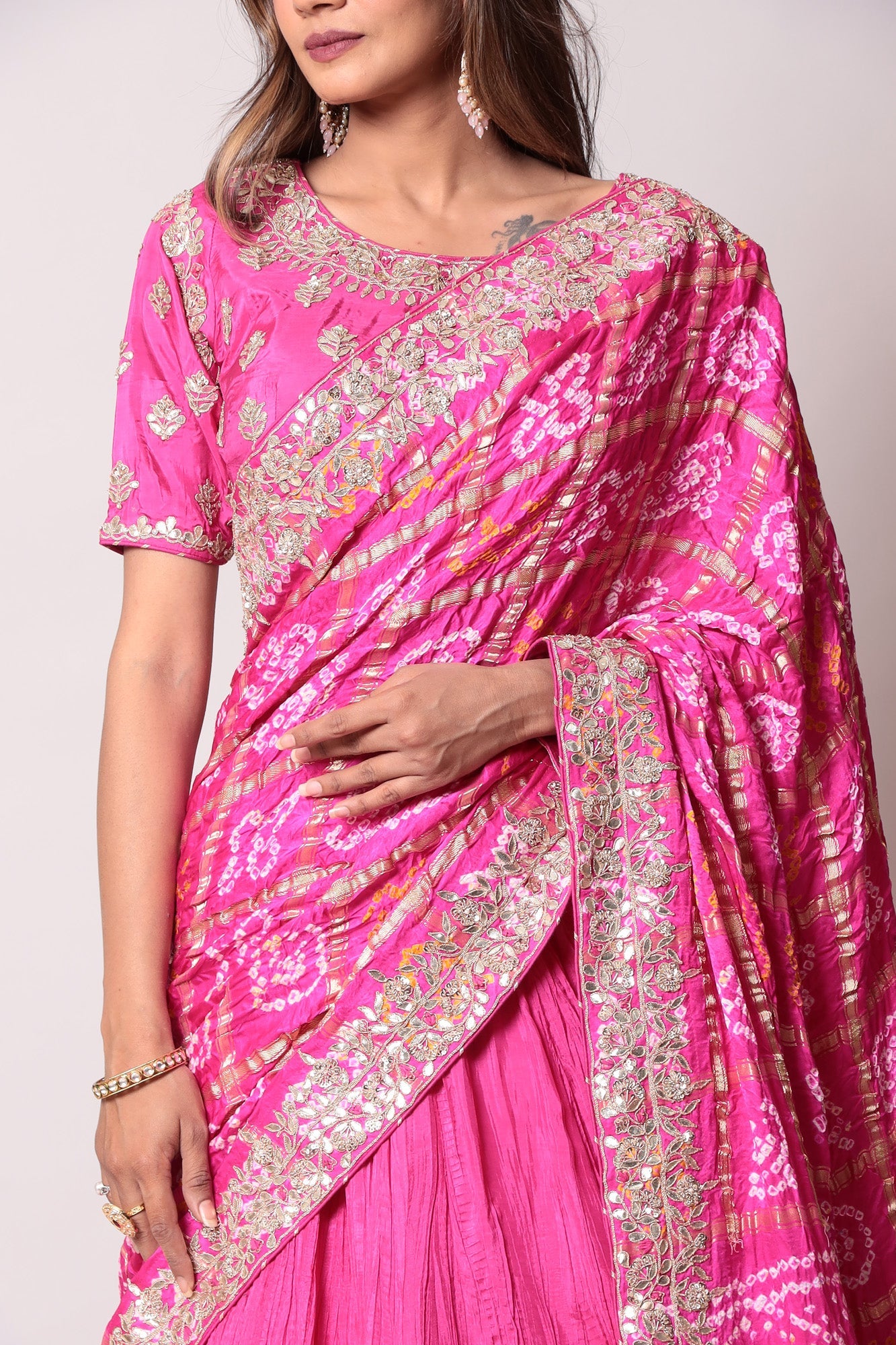 Ghatchola Bandhej Silk Lehenga with Zardozi work.