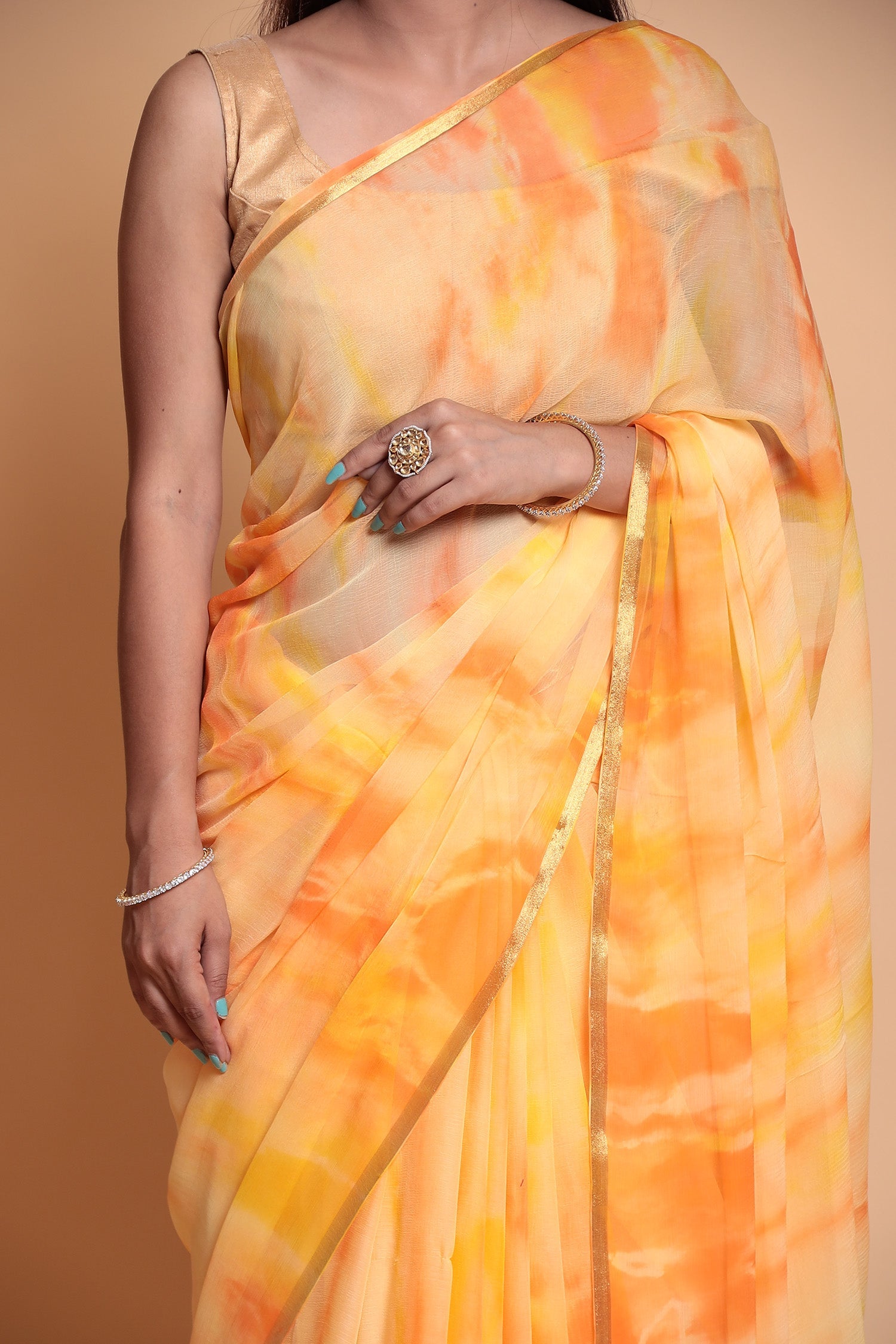 Tie & Dye Chiffon Saree with Zari Border.