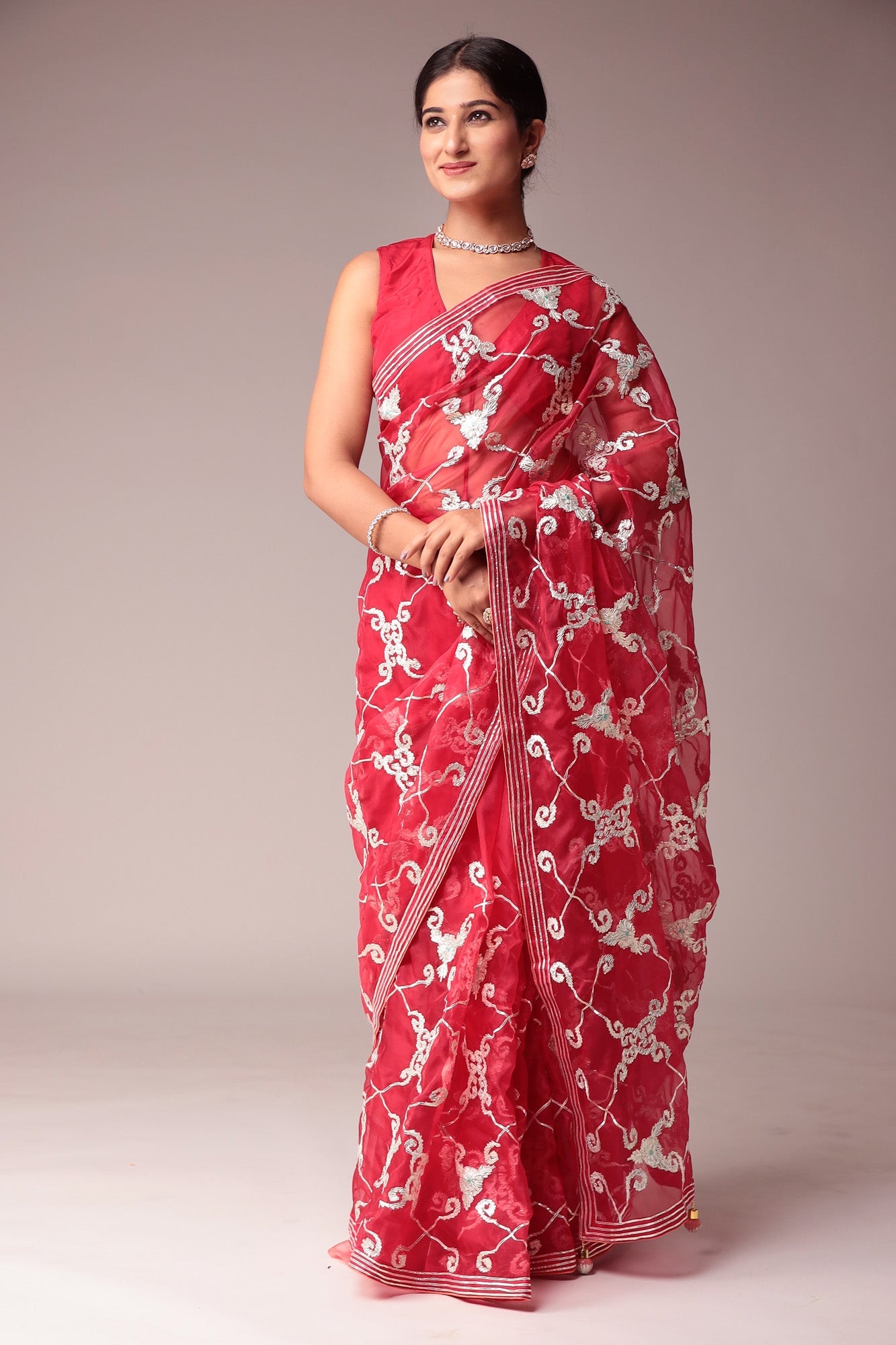 Exquisite Organza Saree with Intricate Gota Embellishments.