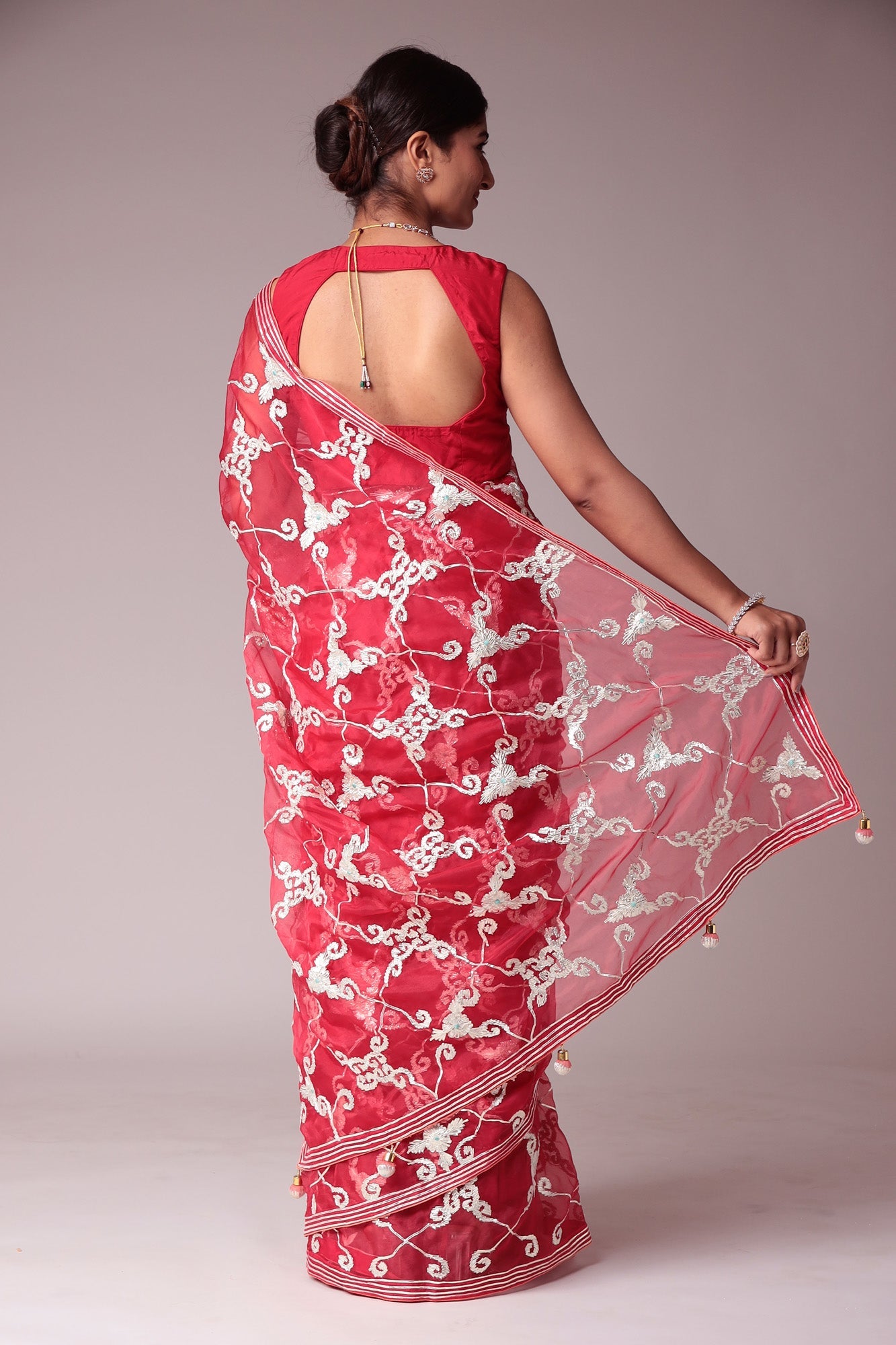 Exquisite Organza Saree with Intricate Gota Embellishments.