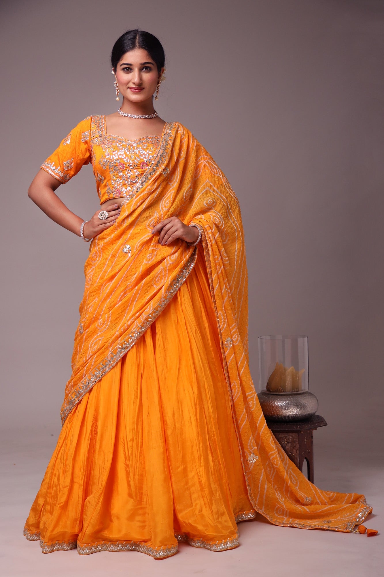 Exquisite Bandhej Silk Lehenga with Intricate Gota Patti Embellishments.