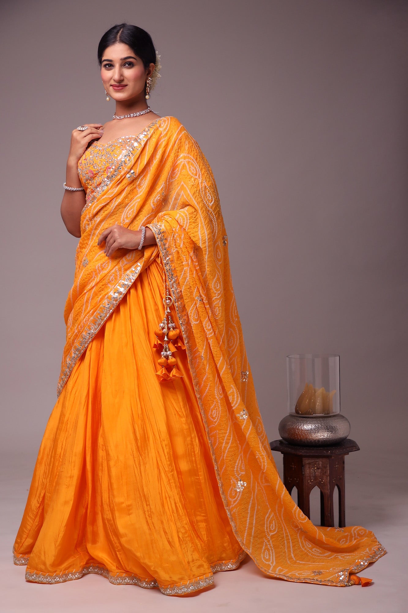 Exquisite Bandhej Silk Lehenga with Intricate Gota Patti Embellishments.