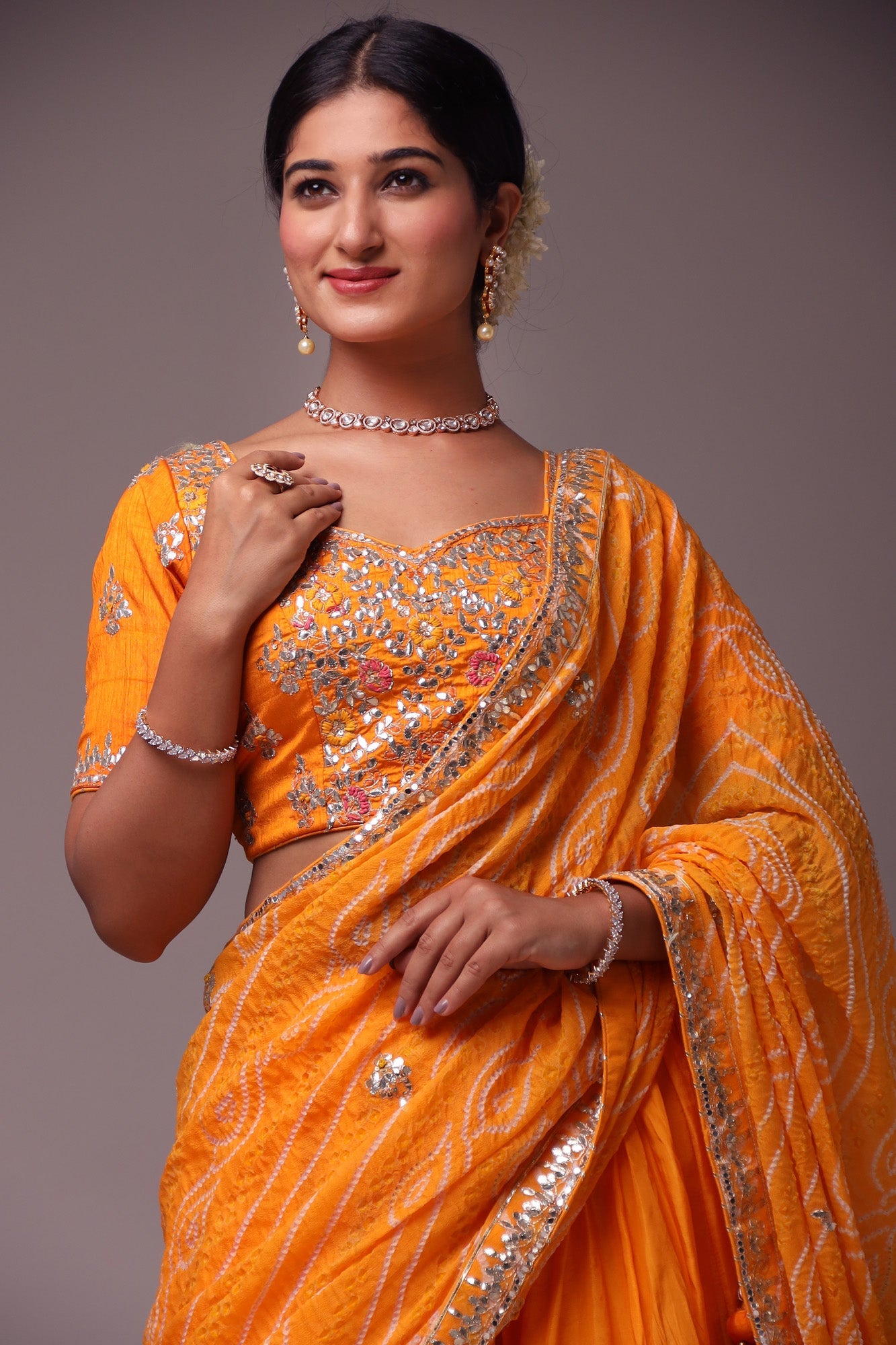 Exquisite Bandhej Silk Lehenga with Intricate Gota Patti Embellishments.