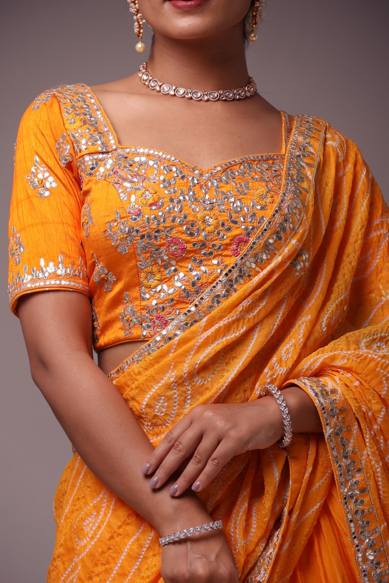 Exquisite Bandhej Silk Lehenga with Intricate Gota Patti Embellishments.