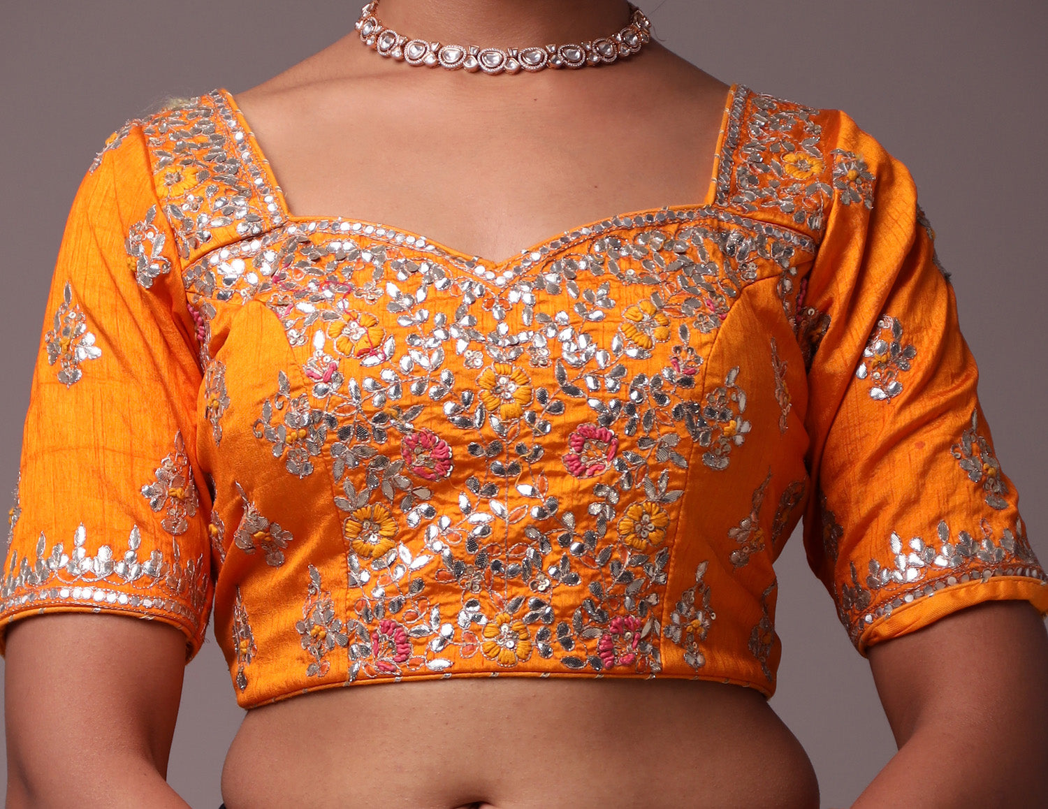 Exquisite Bandhej Silk Lehenga with Intricate Gota Patti Embellishments.