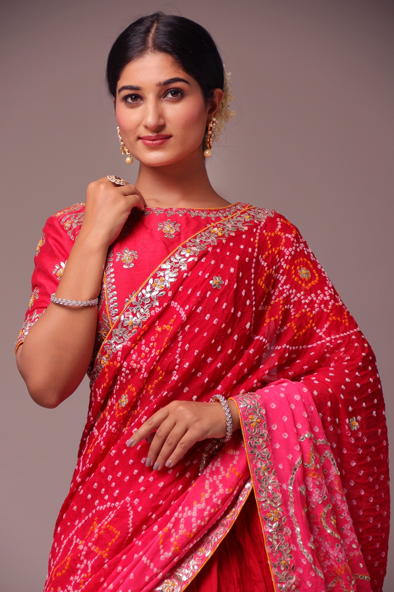 Exquisite Bandhej Silk Lehenga with Intricate Gota Patti Embellishments.