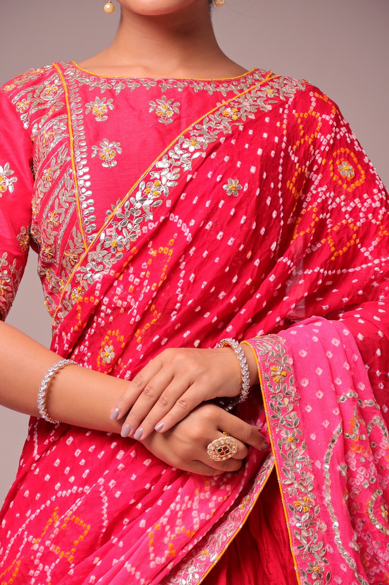 Exquisite Bandhej Silk Lehenga with Intricate Gota Patti Embellishments.