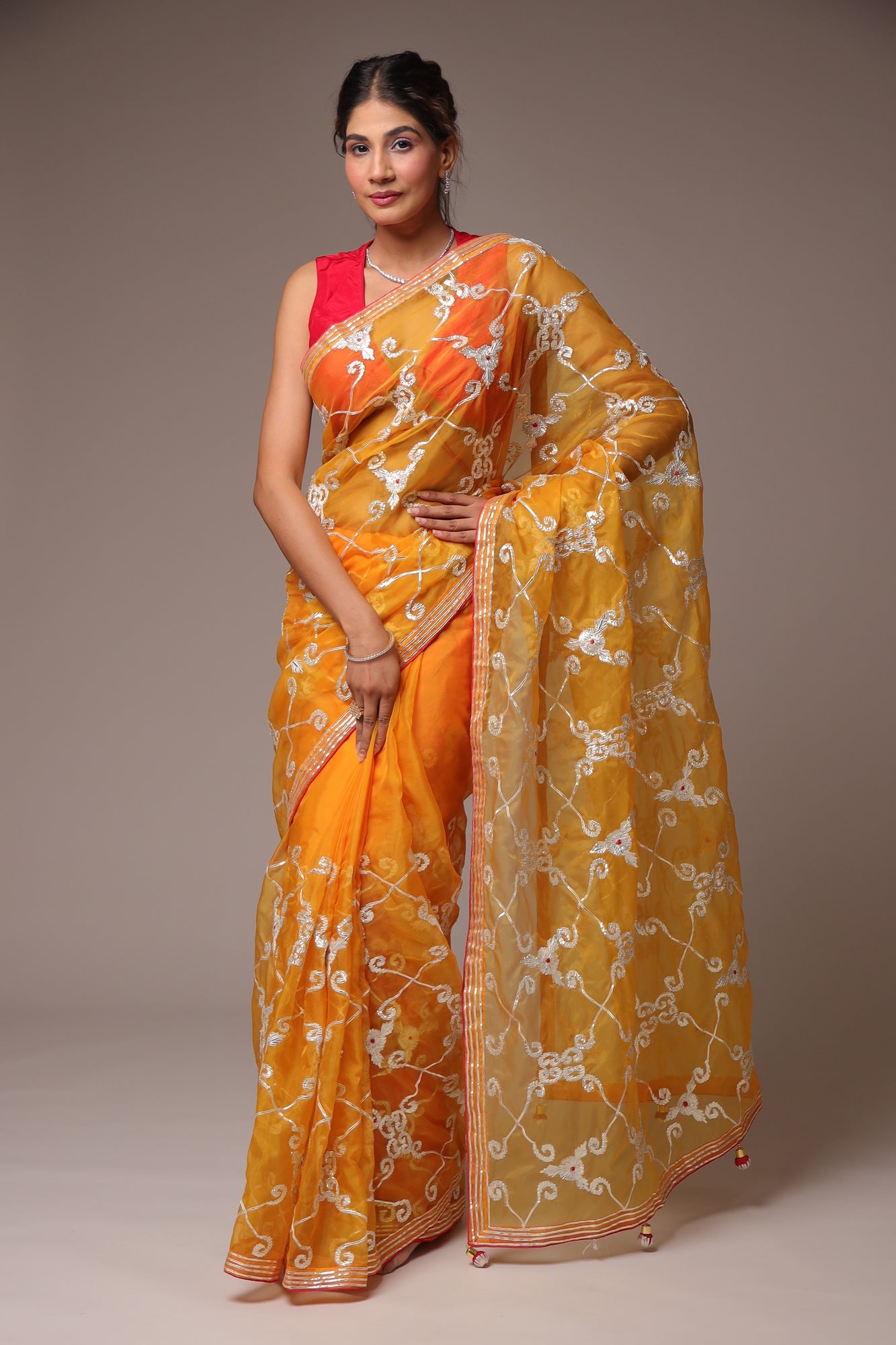 Exquisite Organza Saree with Intricate Gota Embellishments.