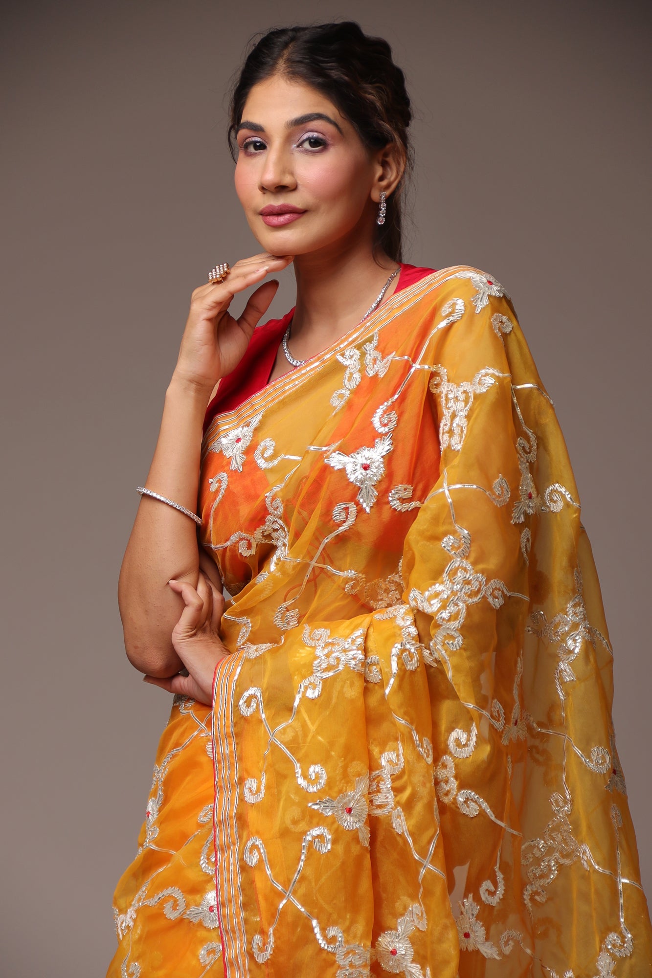 Exquisite Organza Saree with Intricate Gota Embellishments.