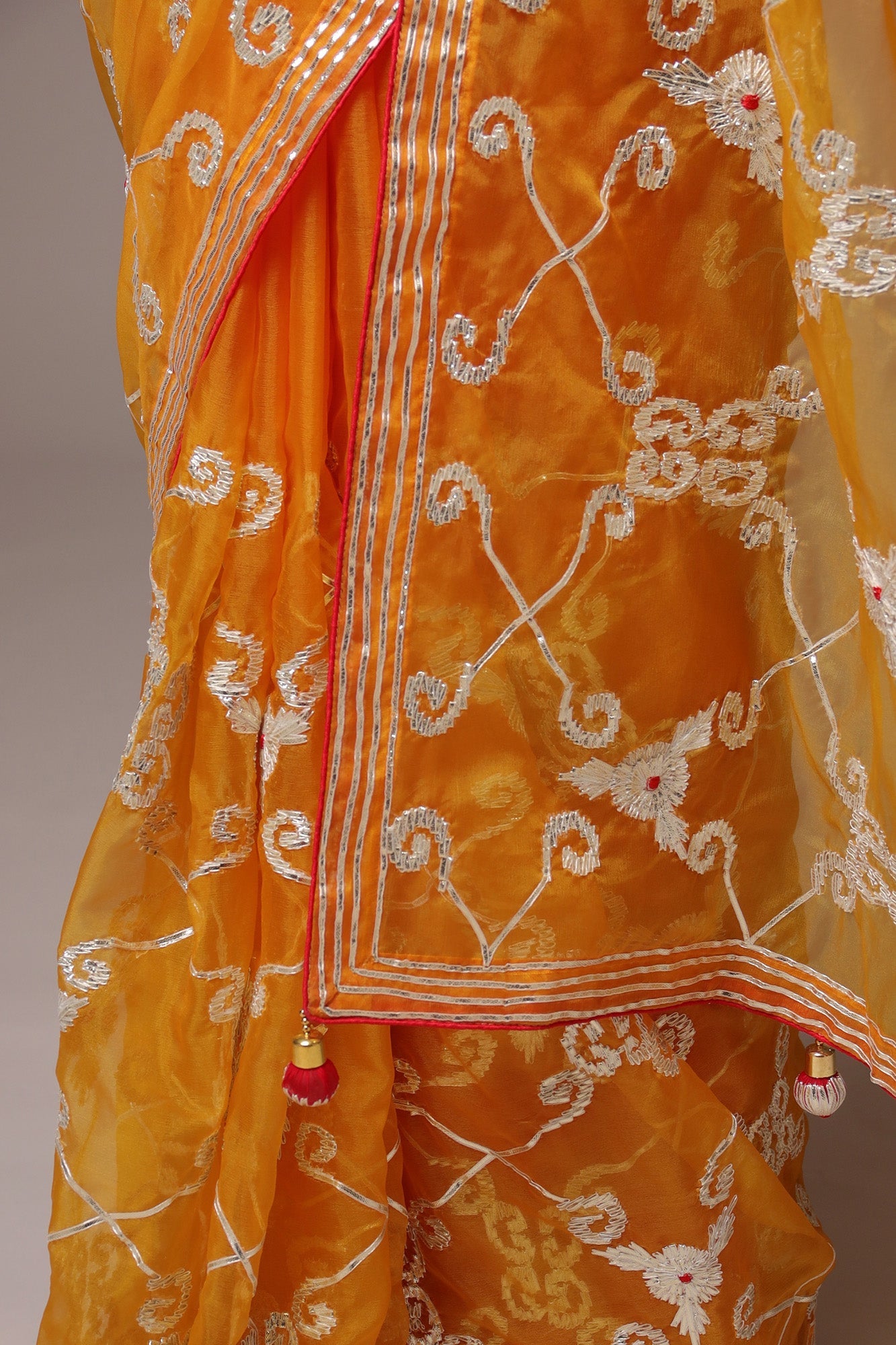 Exquisite Organza Saree with Intricate Gota Embellishments.