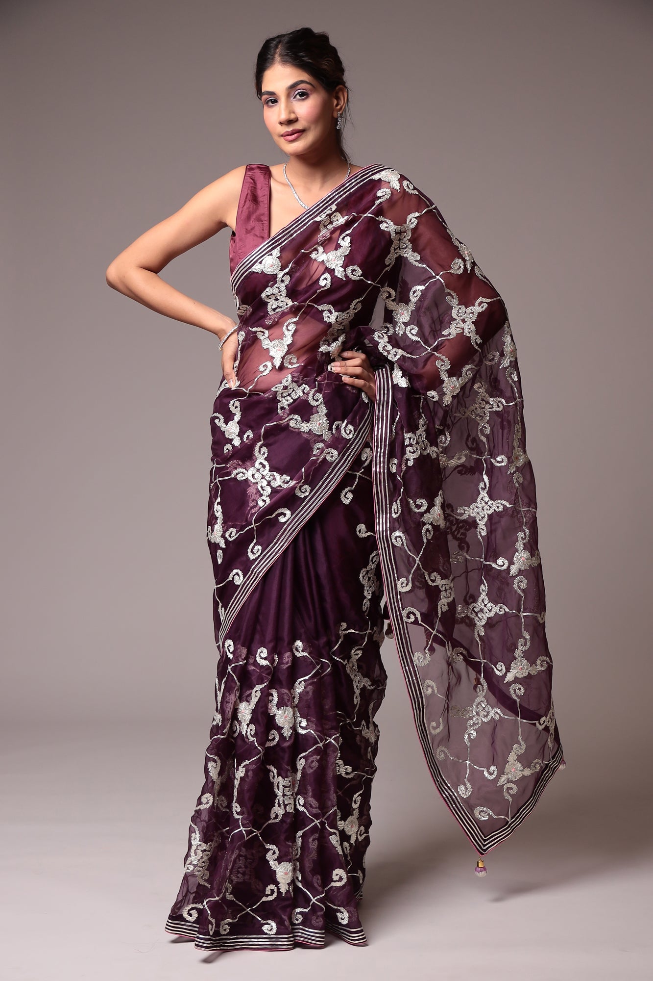 Exquisite Organza Saree with Intricate Gota Embellishments.