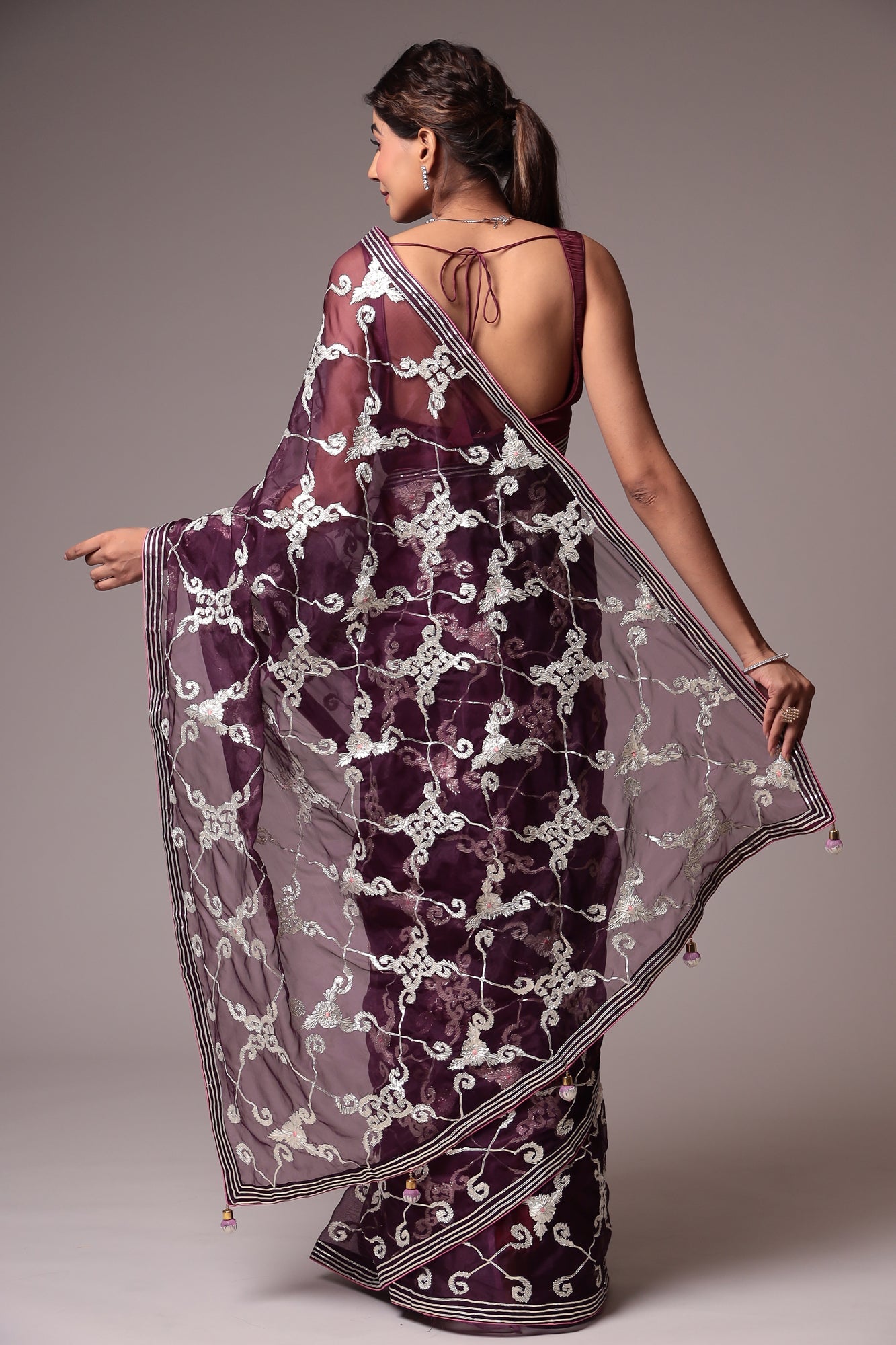 Exquisite Organza Saree with Intricate Gota Embellishments.