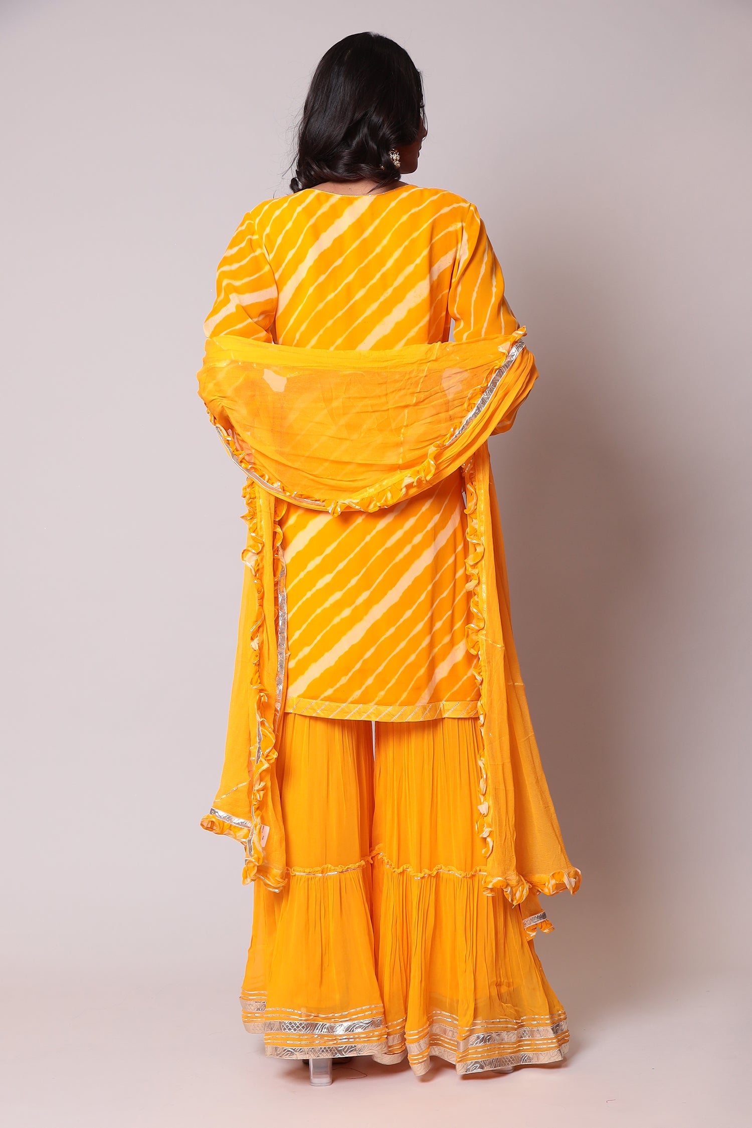 Leheriya Georgette Sharara Suit with Gota Patti work.