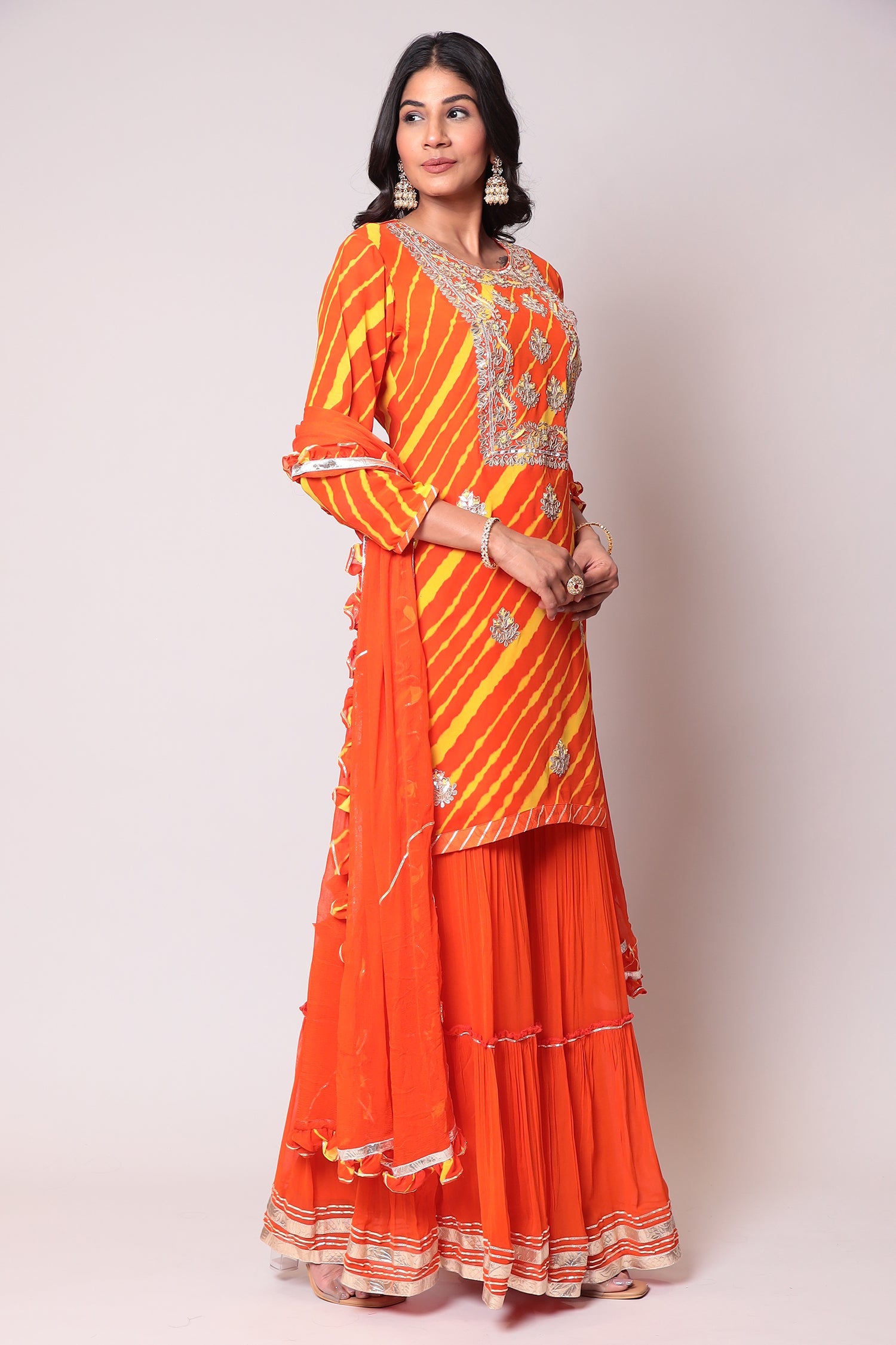 Leheriya Georgette Sharara Suit with Gota Patti work.