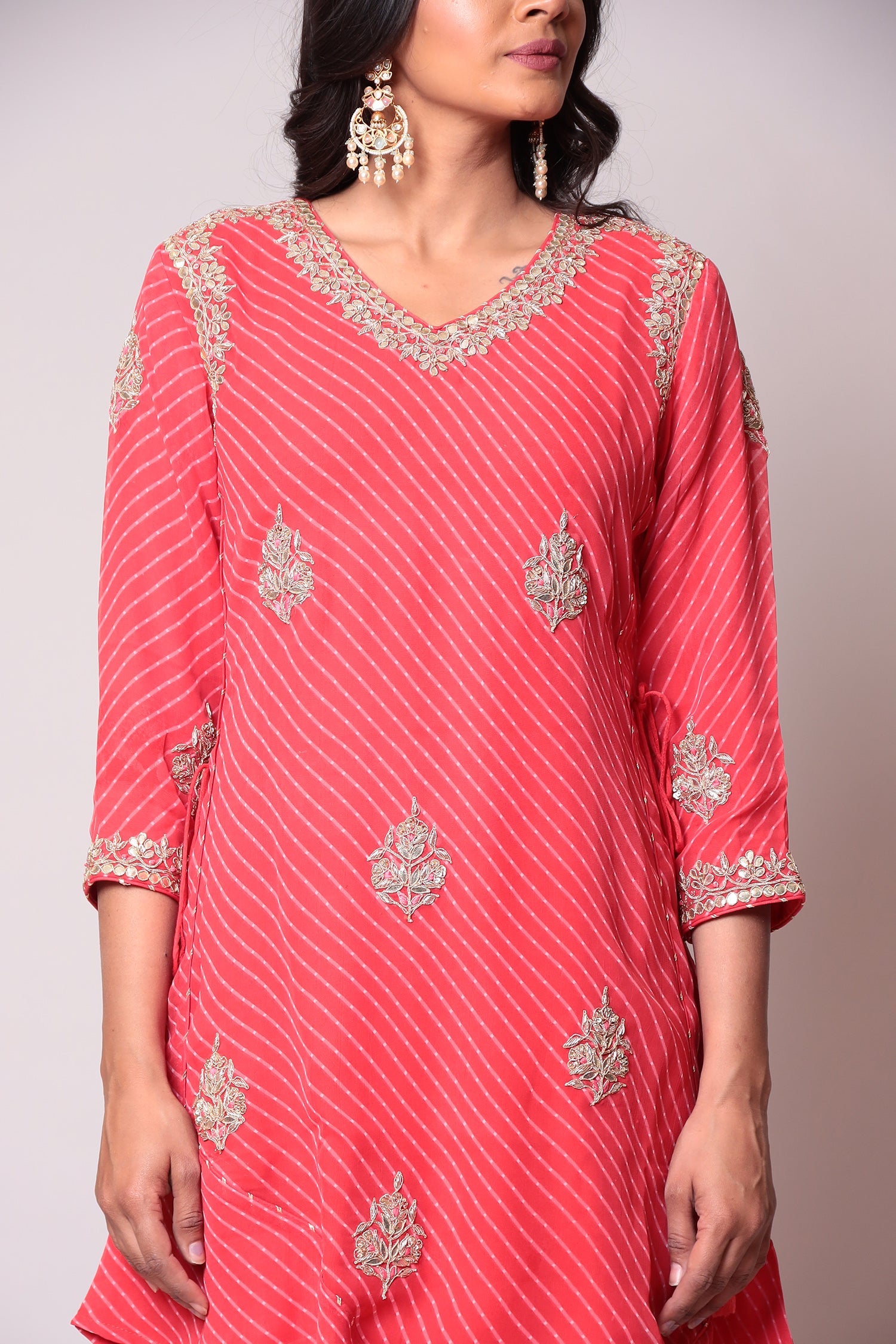 Leheriya Georgette Suit with Gota Patti work.