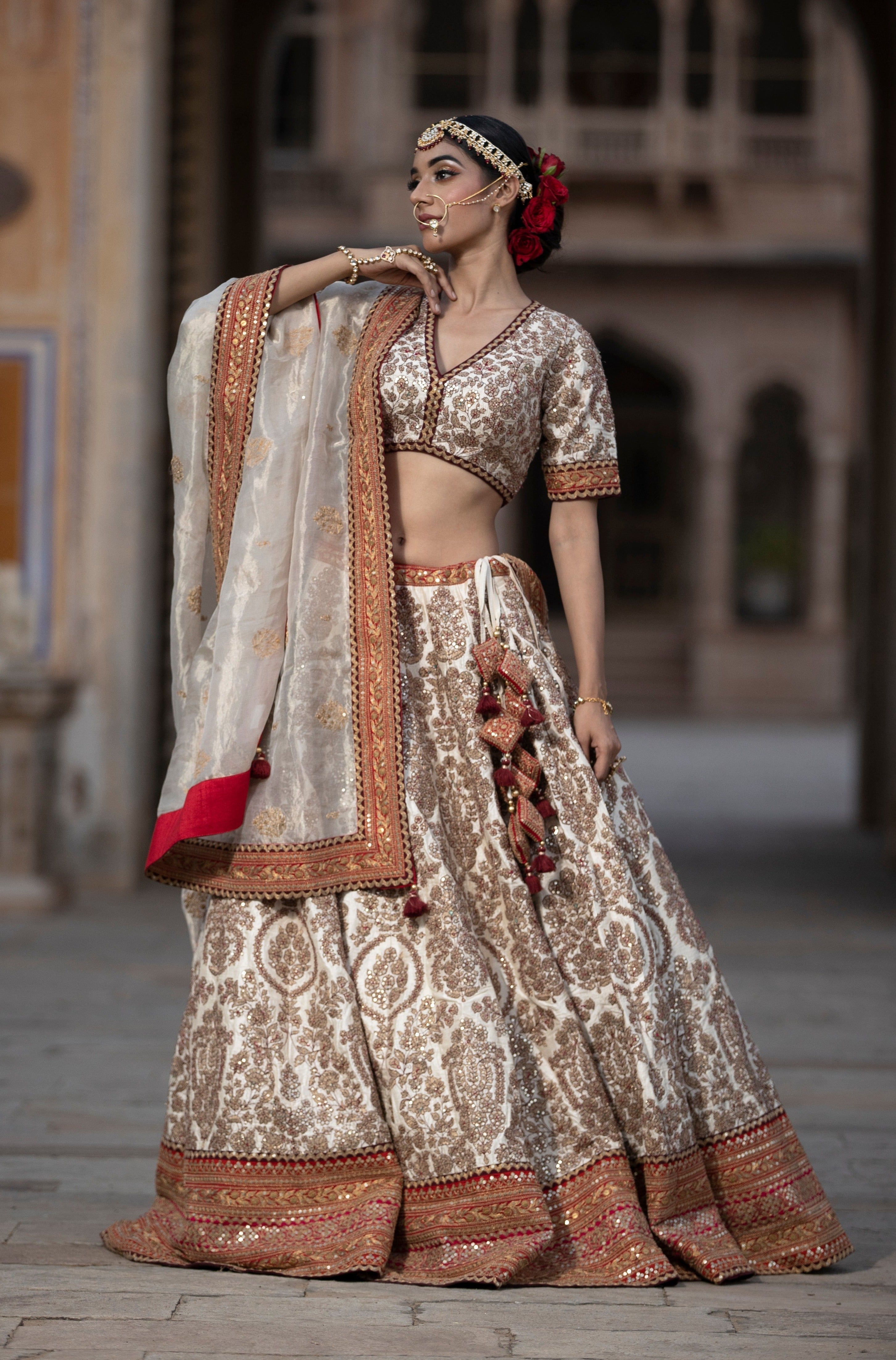 Raw silk Lehenga with Aari, Sequins, Thread work.