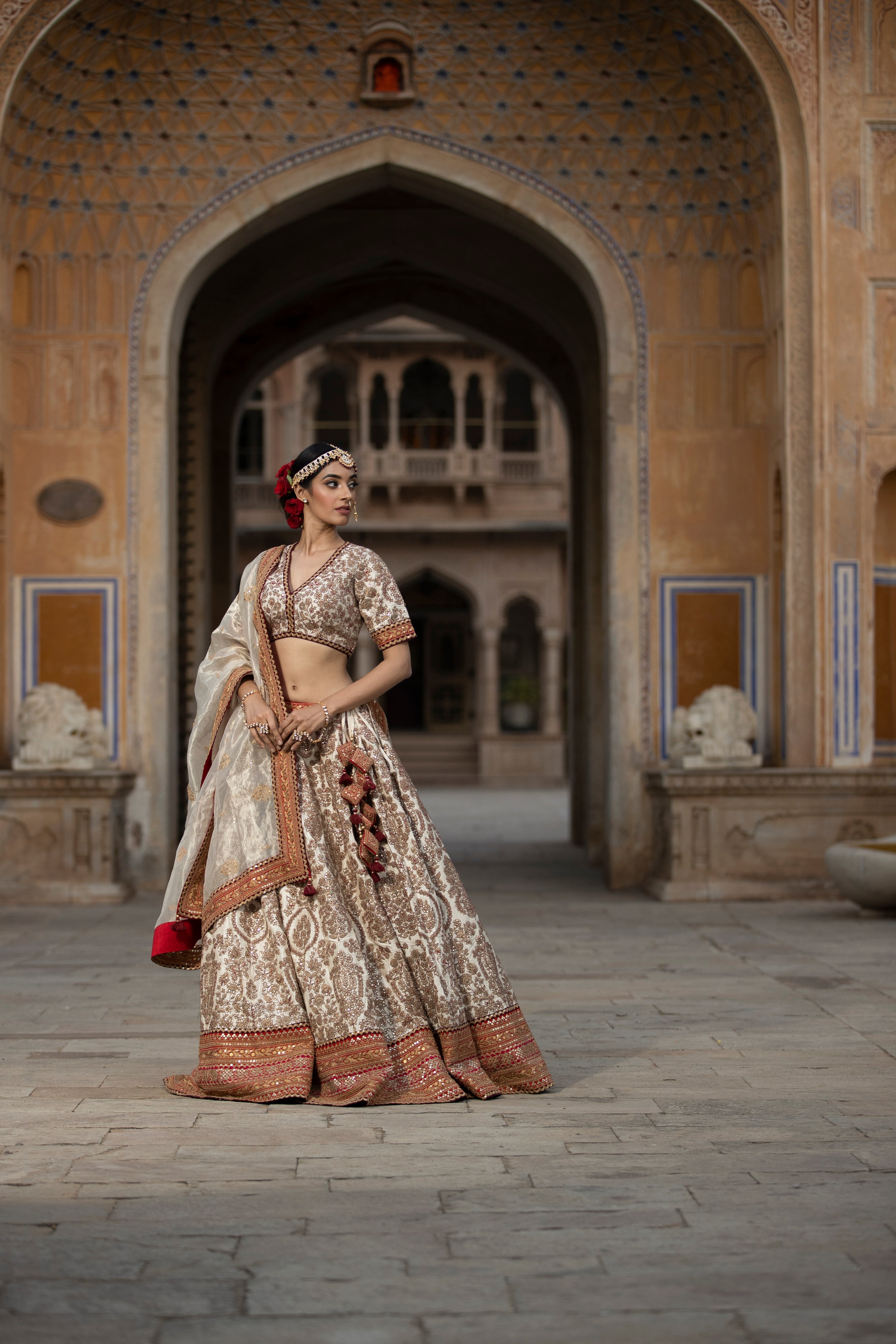 Raw silk Lehenga with Aari, Sequins, Thread work.