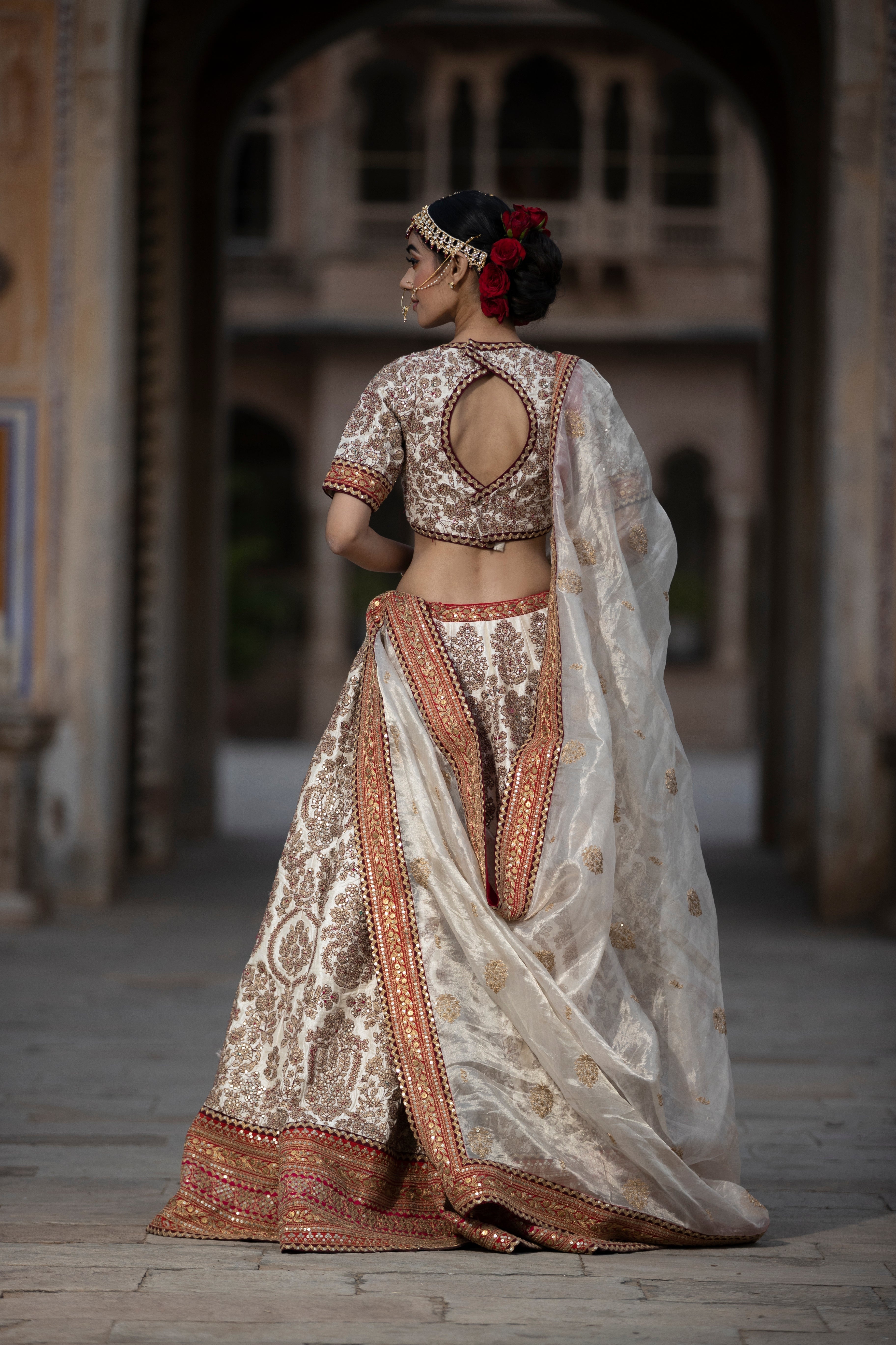 Raw silk Lehenga with Aari, Sequins, Thread work.