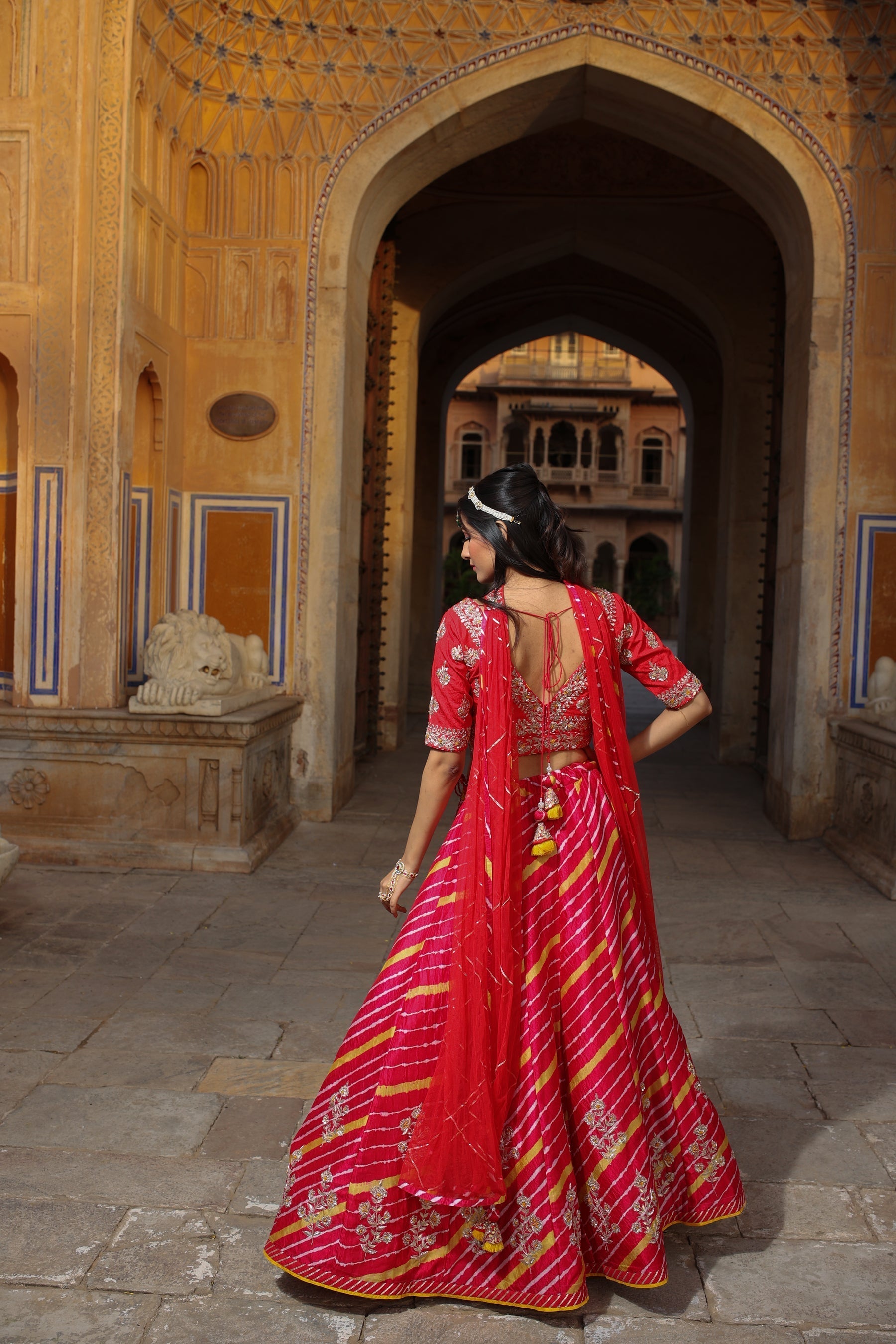 Leheriya Tussar silk Lehenga with Gota Patti work.