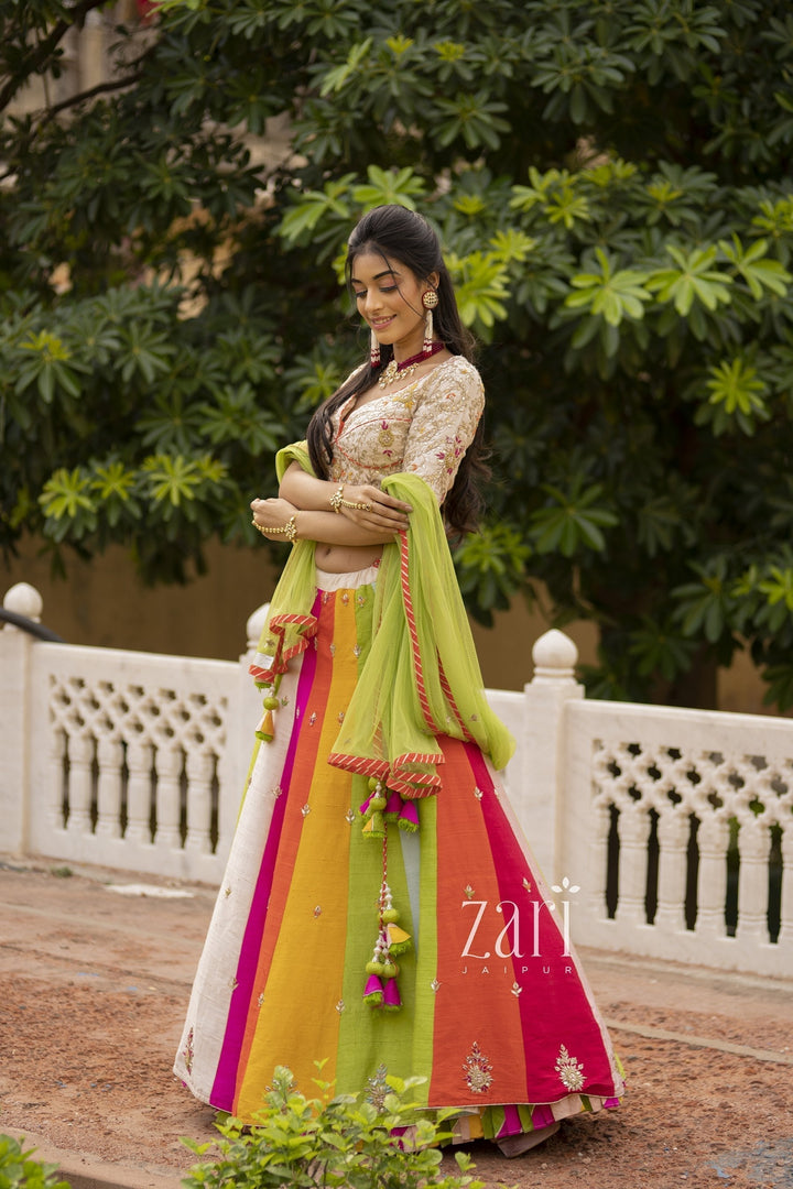 Raw silk Lehenga with Gota Patti, Thread, Zardozi work.